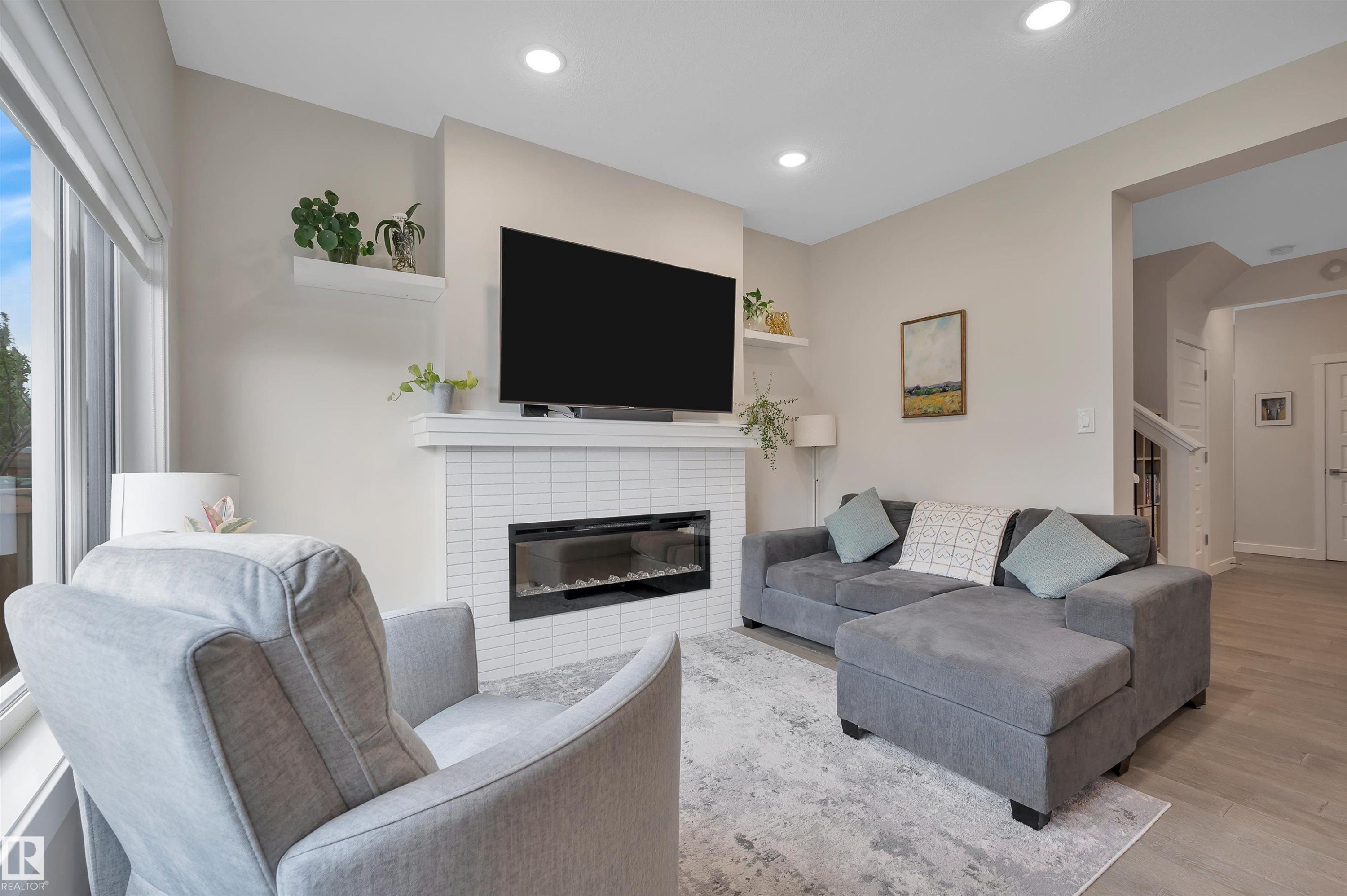 20709 99A Avenue, Edmonton, AB - Indoor Photo Showing Living Room With Fireplace