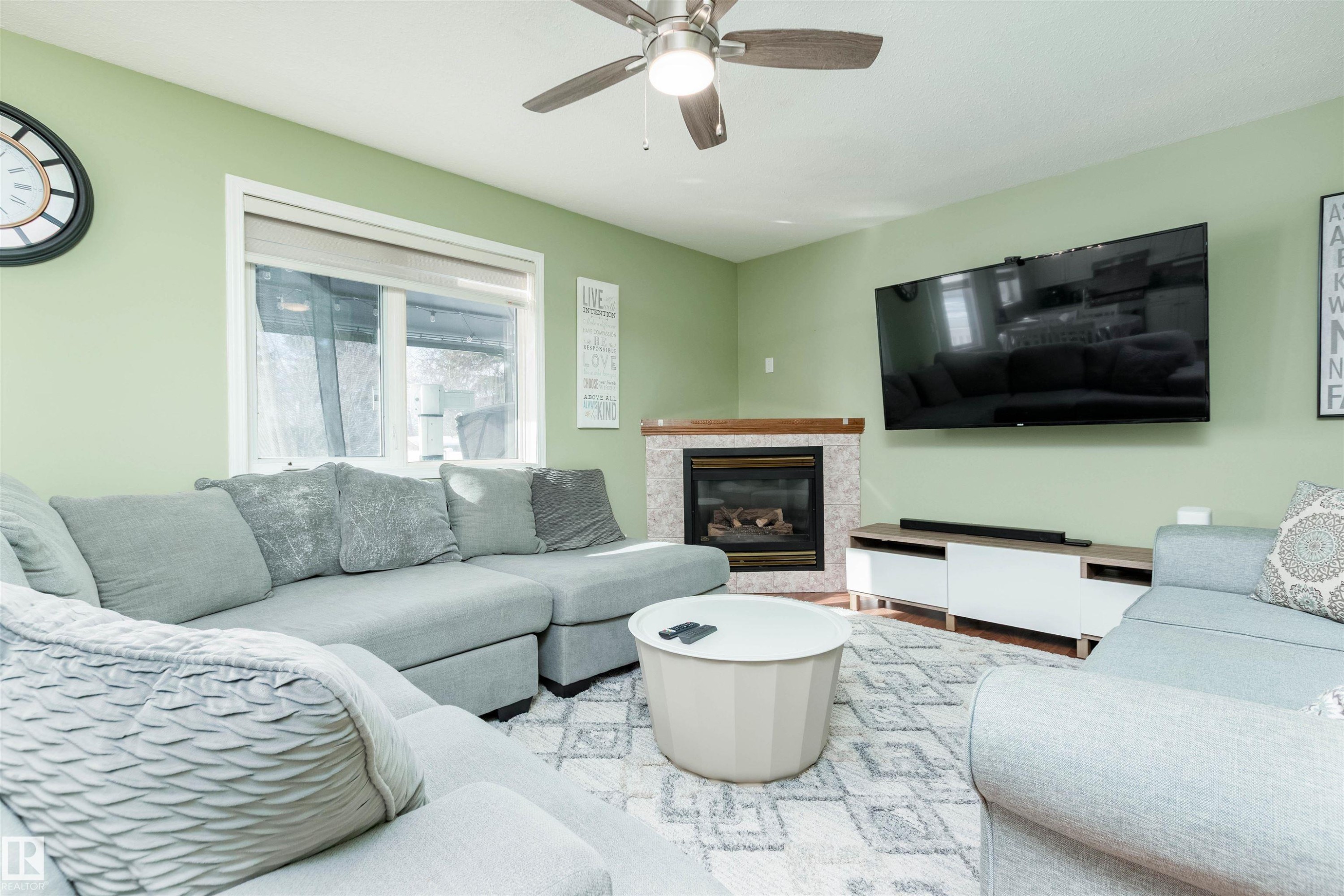 330 Huffman Crescent Nw, Edmonton, AB - Indoor Photo Showing Living Room With Fireplace