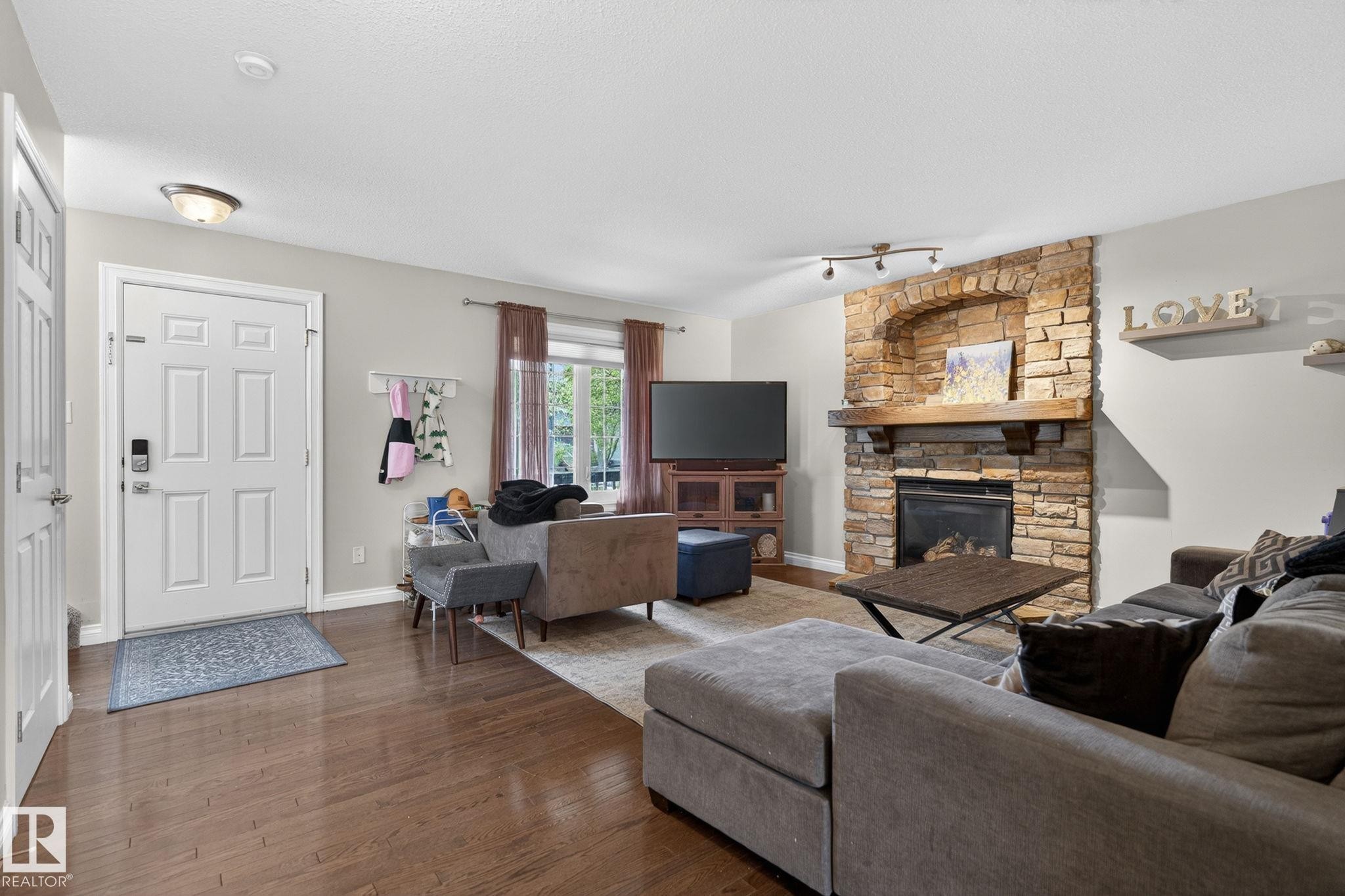 1844 Towne Centre Boulevard, Edmonton, AB - Indoor Photo Showing Living Room With Fireplace