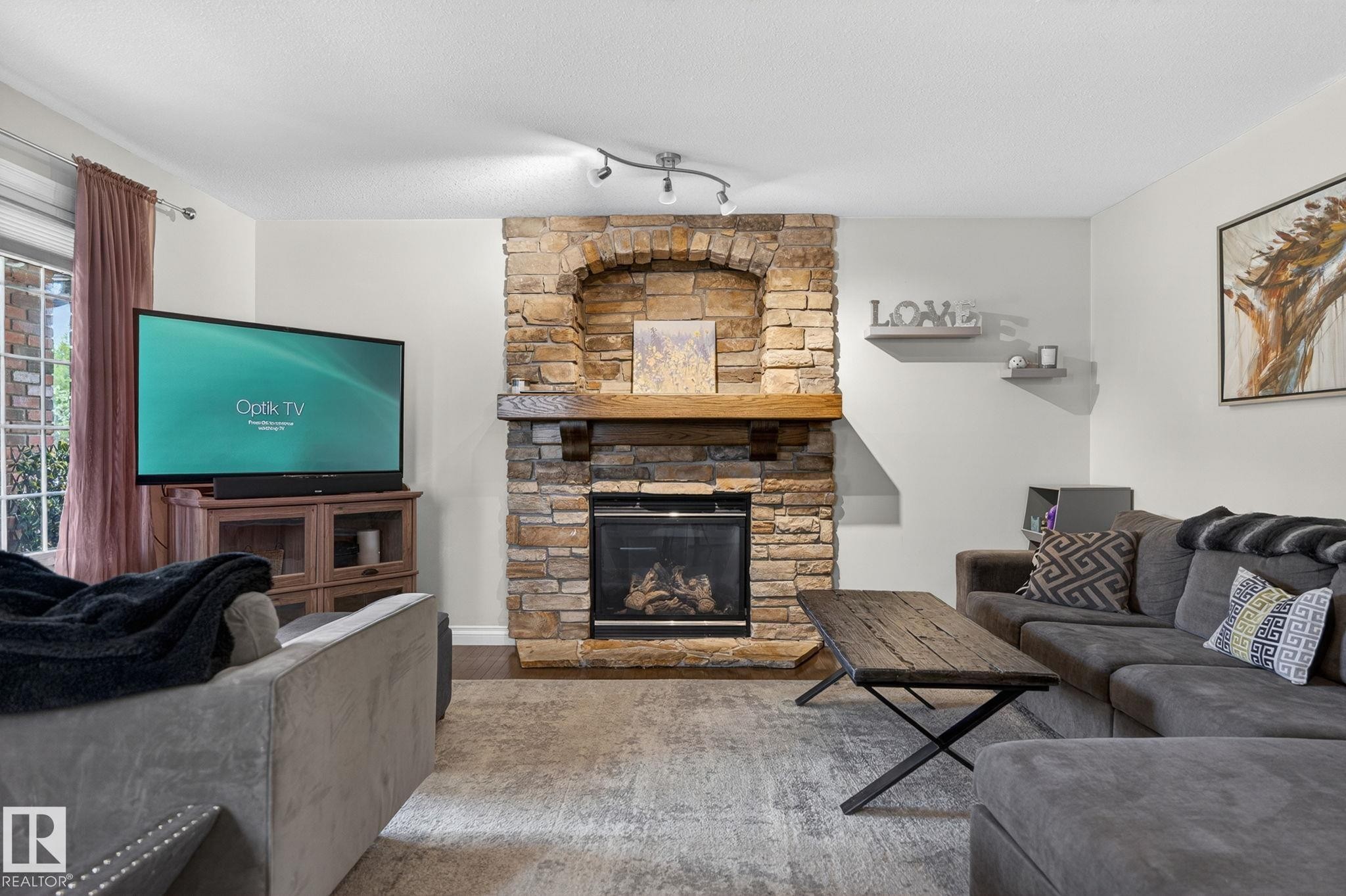 1844 Towne Centre Boulevard, Edmonton, AB - Indoor Photo Showing Living Room With Fireplace