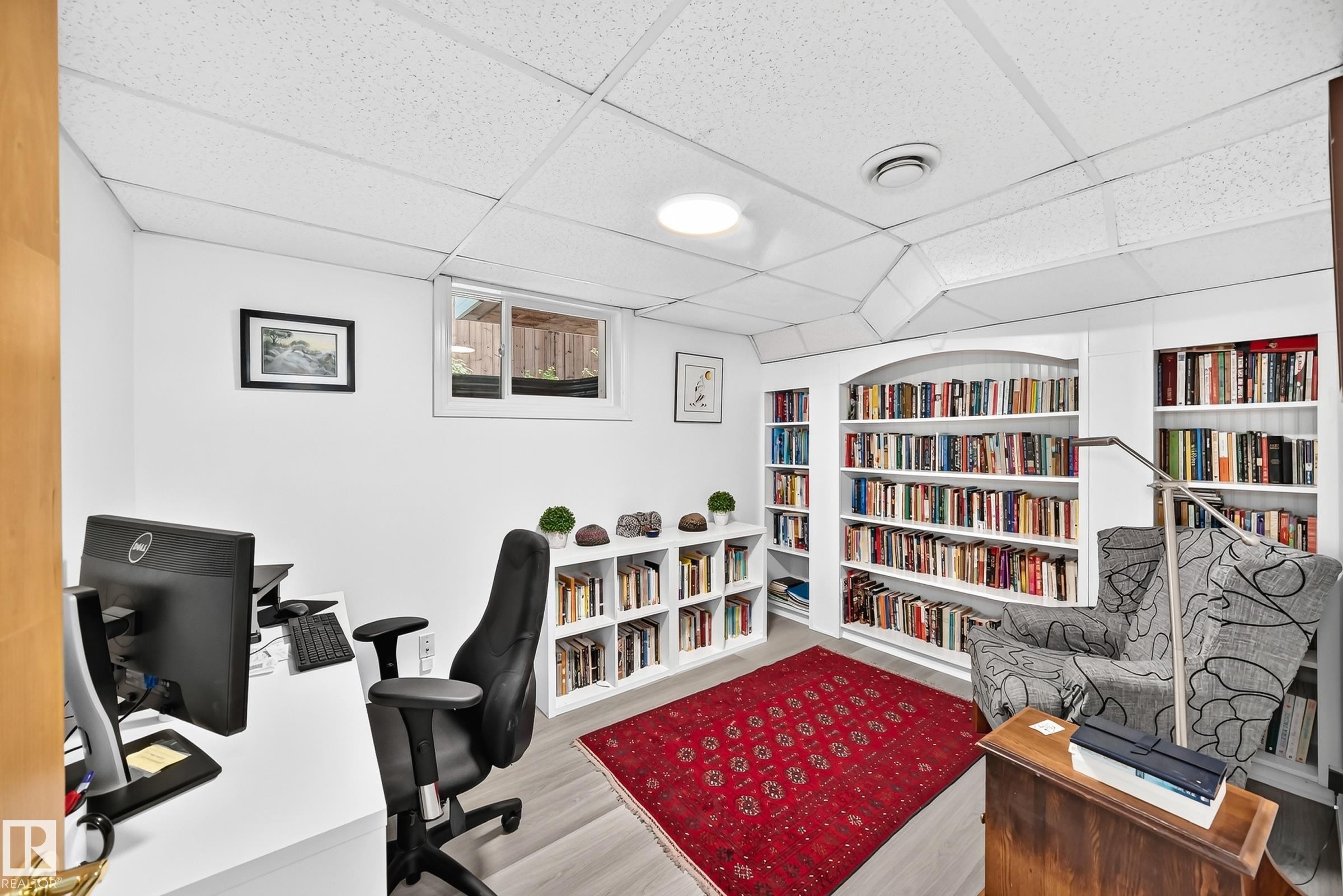 Versatile room with light wood-finish flooring, recessed lighting, and a drop-tile ceiling - 10323 138 Street Nw, Edmonton, AB - Indoor Photo Showing Office