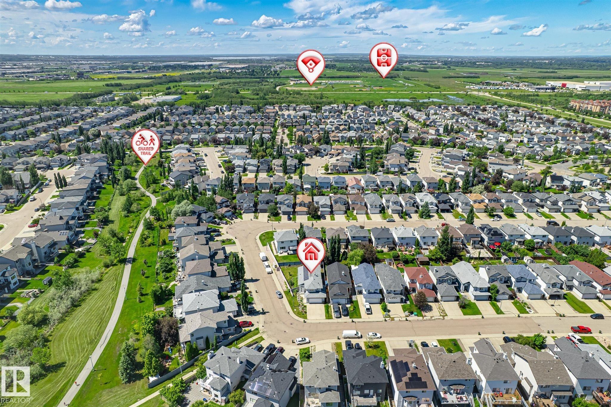 Aerial overview of a residential neighborhood with numerous detached homes - 14908 137 Street Nw, Edmonton, AB - Outdoor With View