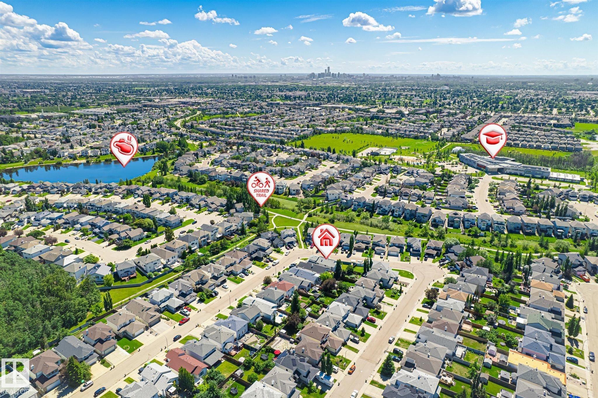 Aerial view of a residential neighborhood with varied architectural styles - 14908 137 Street Nw, Edmonton, AB - Outdoor With View