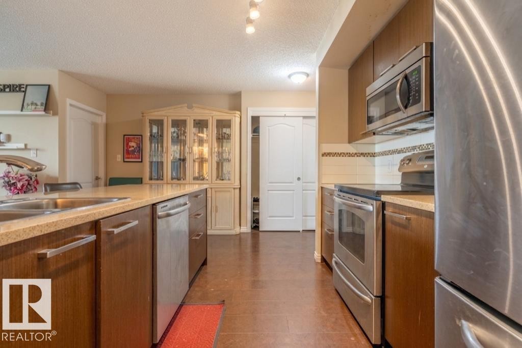#2401 7343 South Terwillegar Dr Nw, Edmonton, AB - Indoor Photo Showing Kitchen With Double Sink