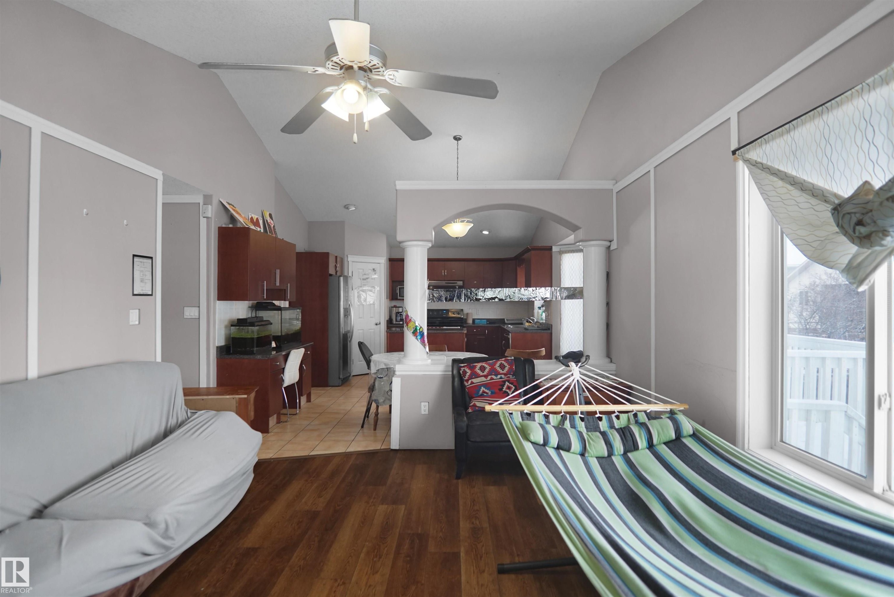 Vaulted ceilings featuring a ceiling fan with integrated lighting - 4816 155 Ave, Edmonton, AB