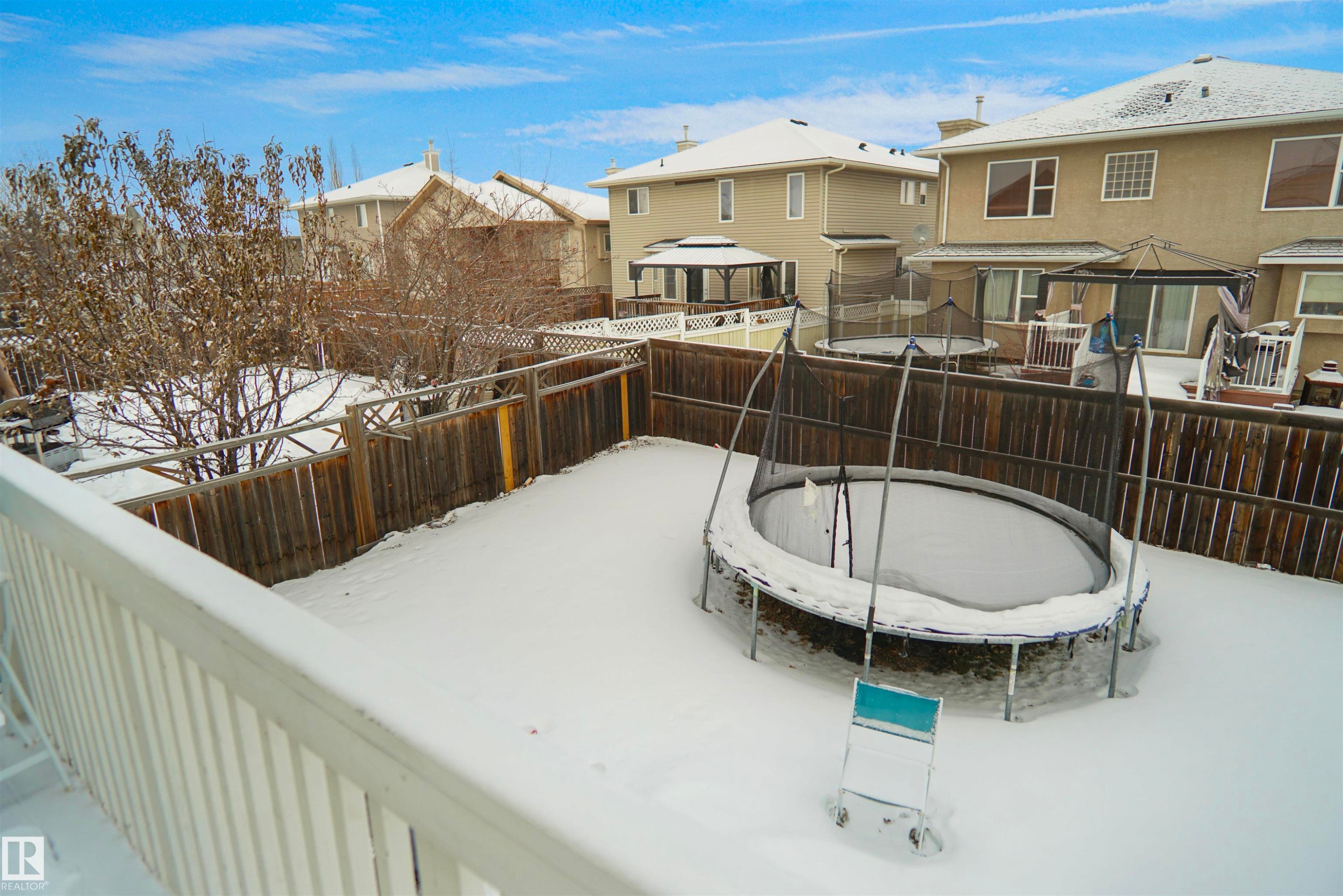Private fenced backyard featuring mature trees - 4816 155 Ave, Edmonton, AB