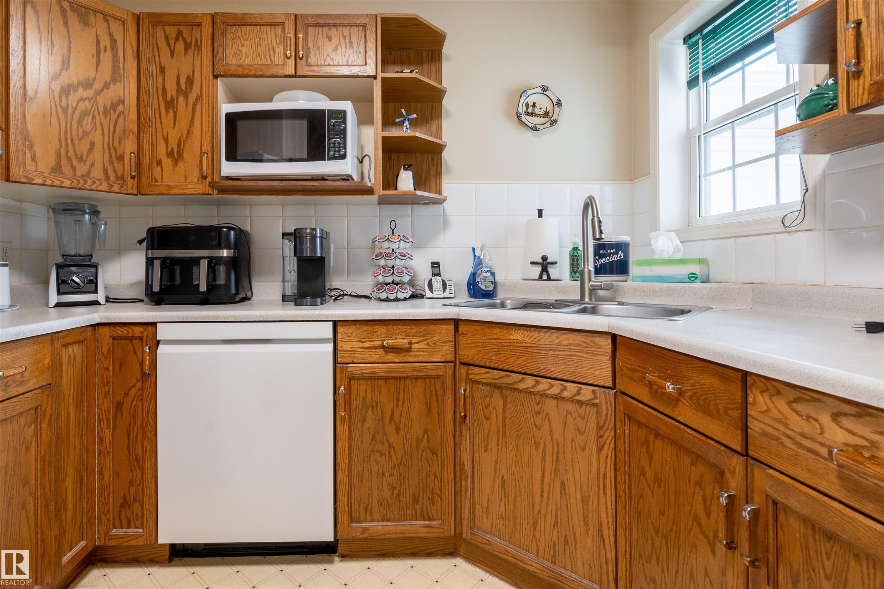 #48 3311 58 St Nw, Edmonton, AB - Indoor Photo Showing Kitchen With Double Sink