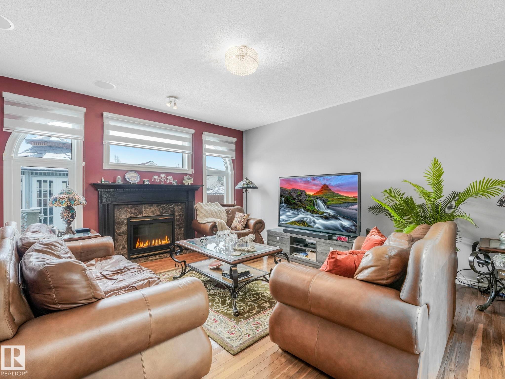 16237 129A Street Nw, Edmonton, AB - Indoor Photo Showing Living Room With Fireplace