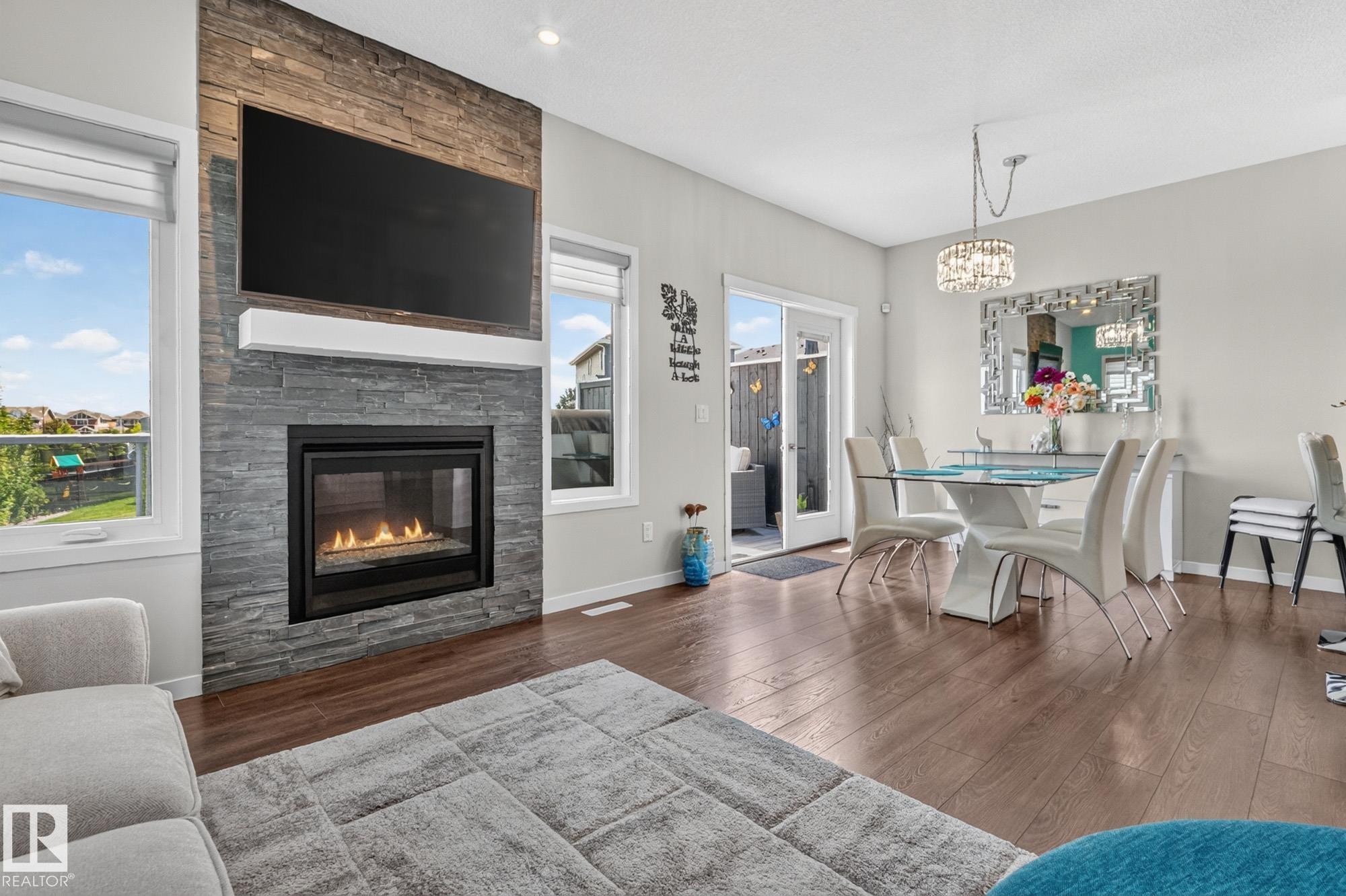 866 Ebbers Crescent Nw, Edmonton, AB - Indoor Photo Showing Living Room With Fireplace