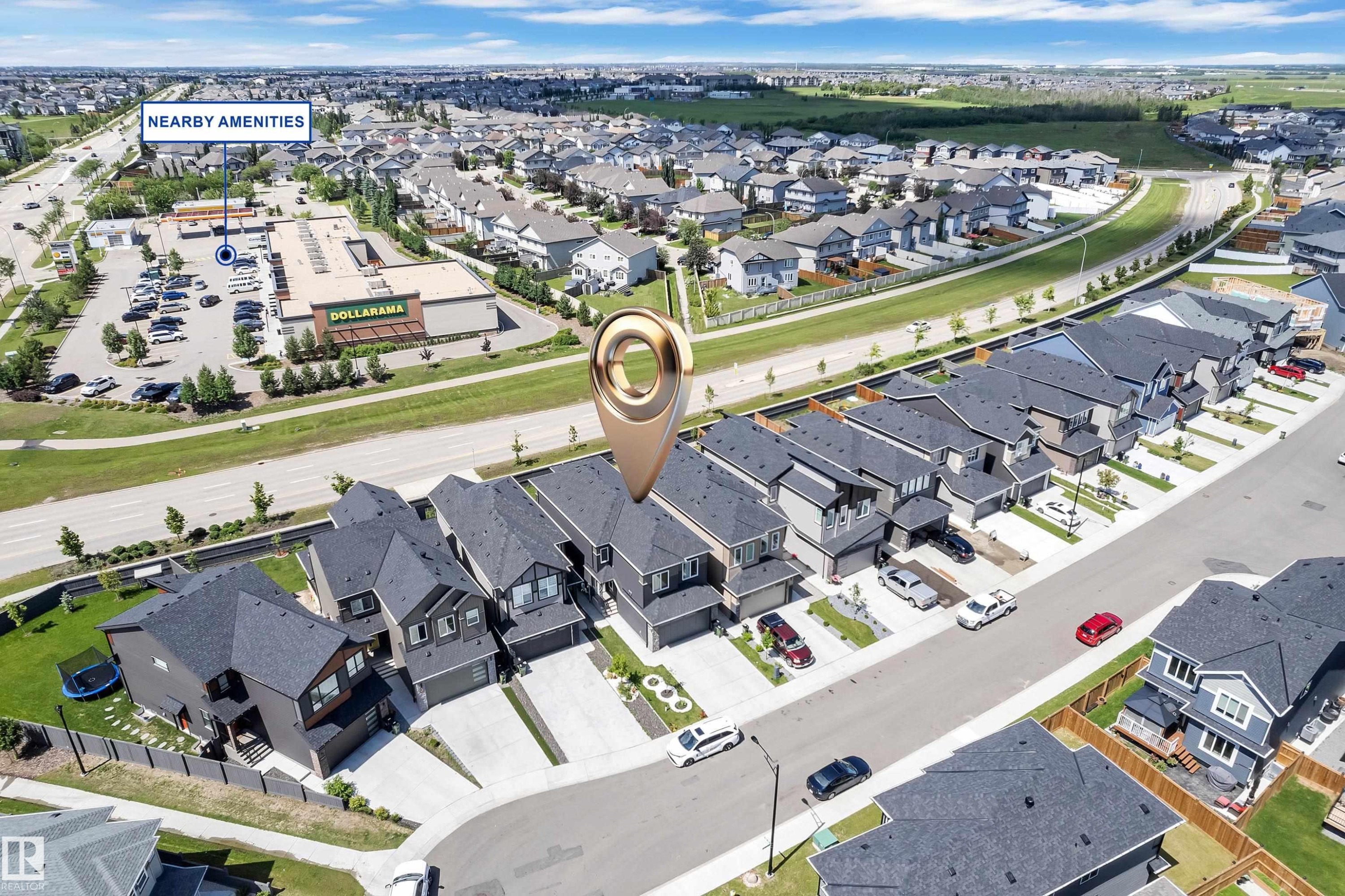 Aerial perspective showcasing a modern residential neighborhood with a variety of housing styles - 16816 49 Street, Edmonton, AB