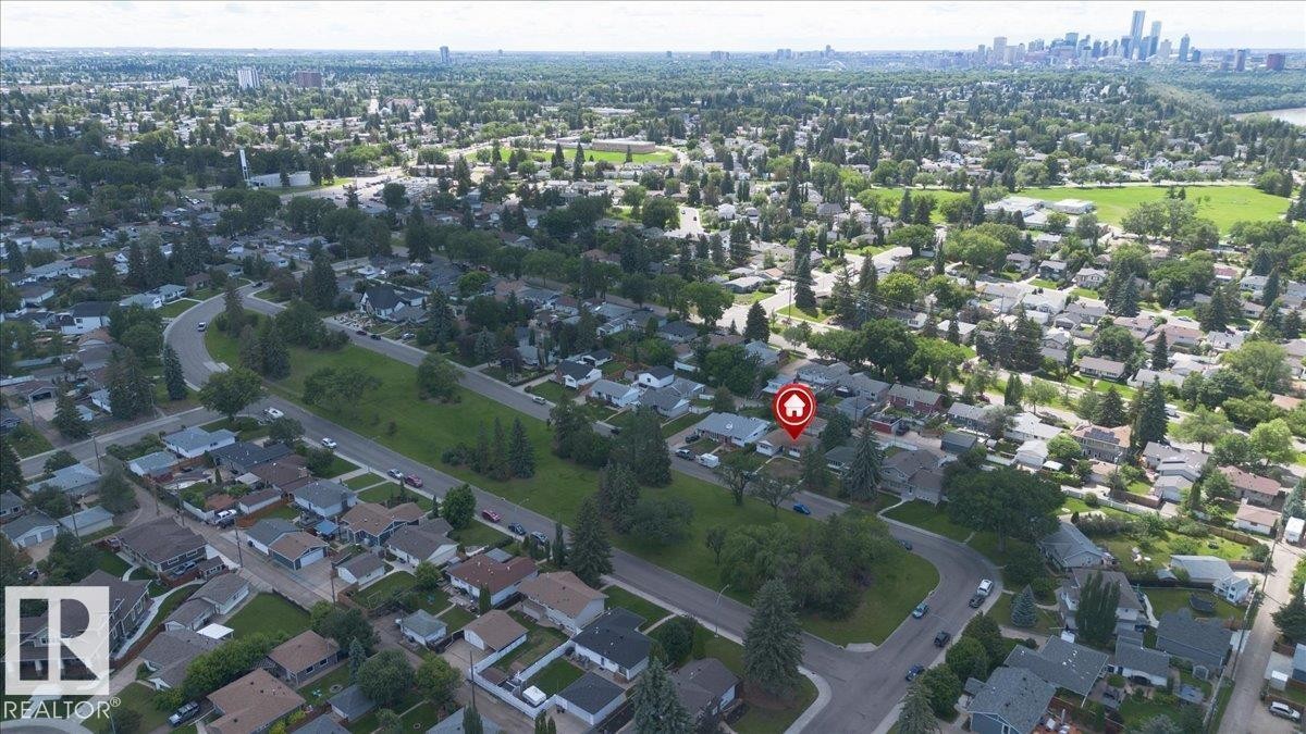 Aerial perspective showcasing a residential neighborhood with established trees and green spaces - 10736 48 Street Nw, Edmonton, AB - With View