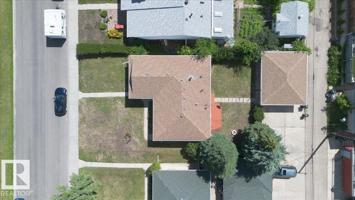 Aerial view showcasing a residential property with a detached garage - 10736 48 Street Nw, Edmonton, AB - Outdoor