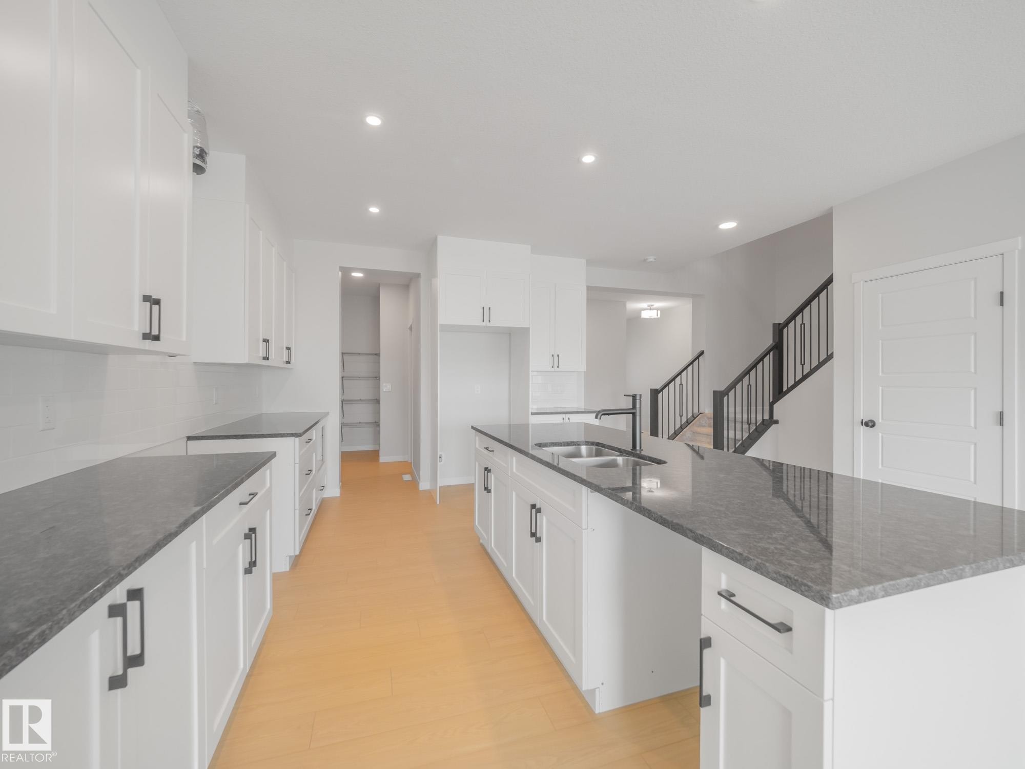 927 18 Avenue Nw, Edmonton, AB - Indoor Photo Showing Kitchen With Double Sink With Upgraded Kitchen