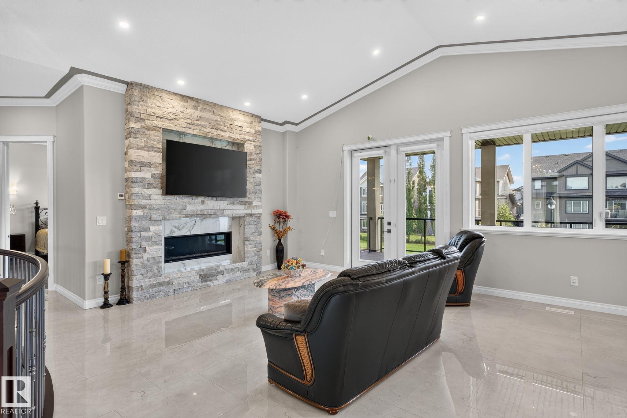 4707 Woolsey Common Sw, Edmonton, AB - Indoor With Fireplace