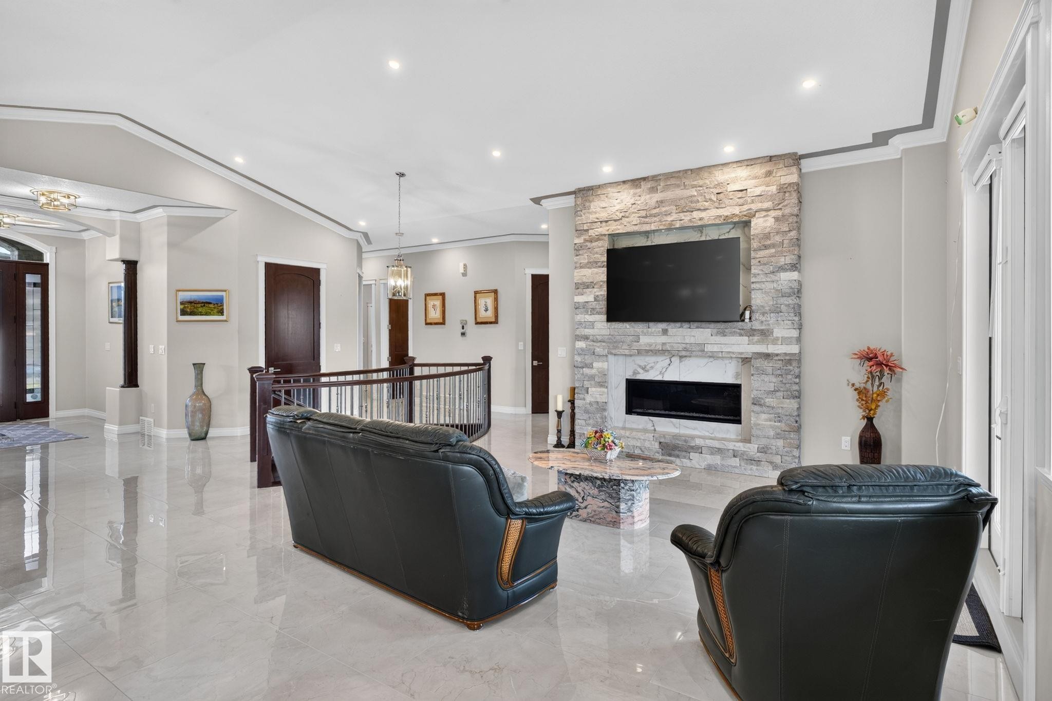 4707 Woolsey Common Sw, Edmonton, AB - Indoor With Fireplace