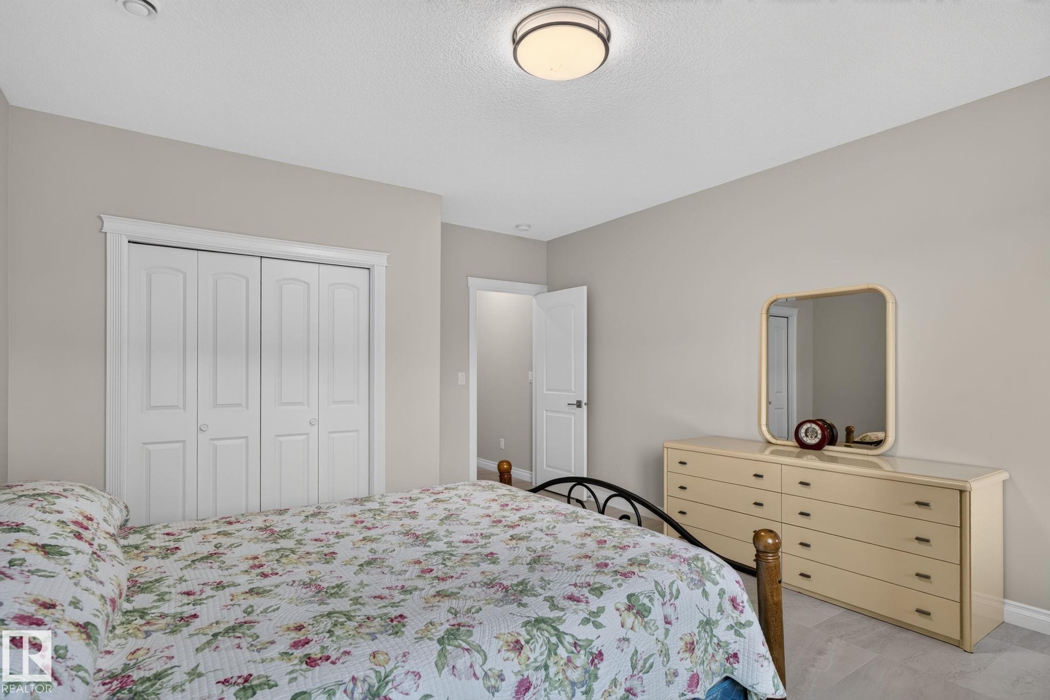 4707 Woolsey Common Sw, Edmonton, AB - Indoor Photo Showing Bedroom