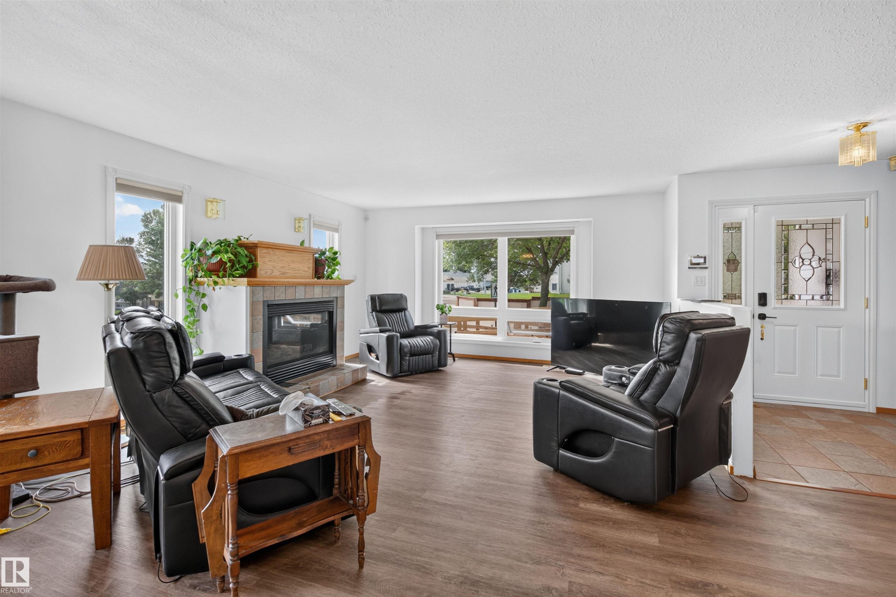 6000 54 Avenue, Camrose, AB - Indoor Photo Showing Living Room With Fireplace