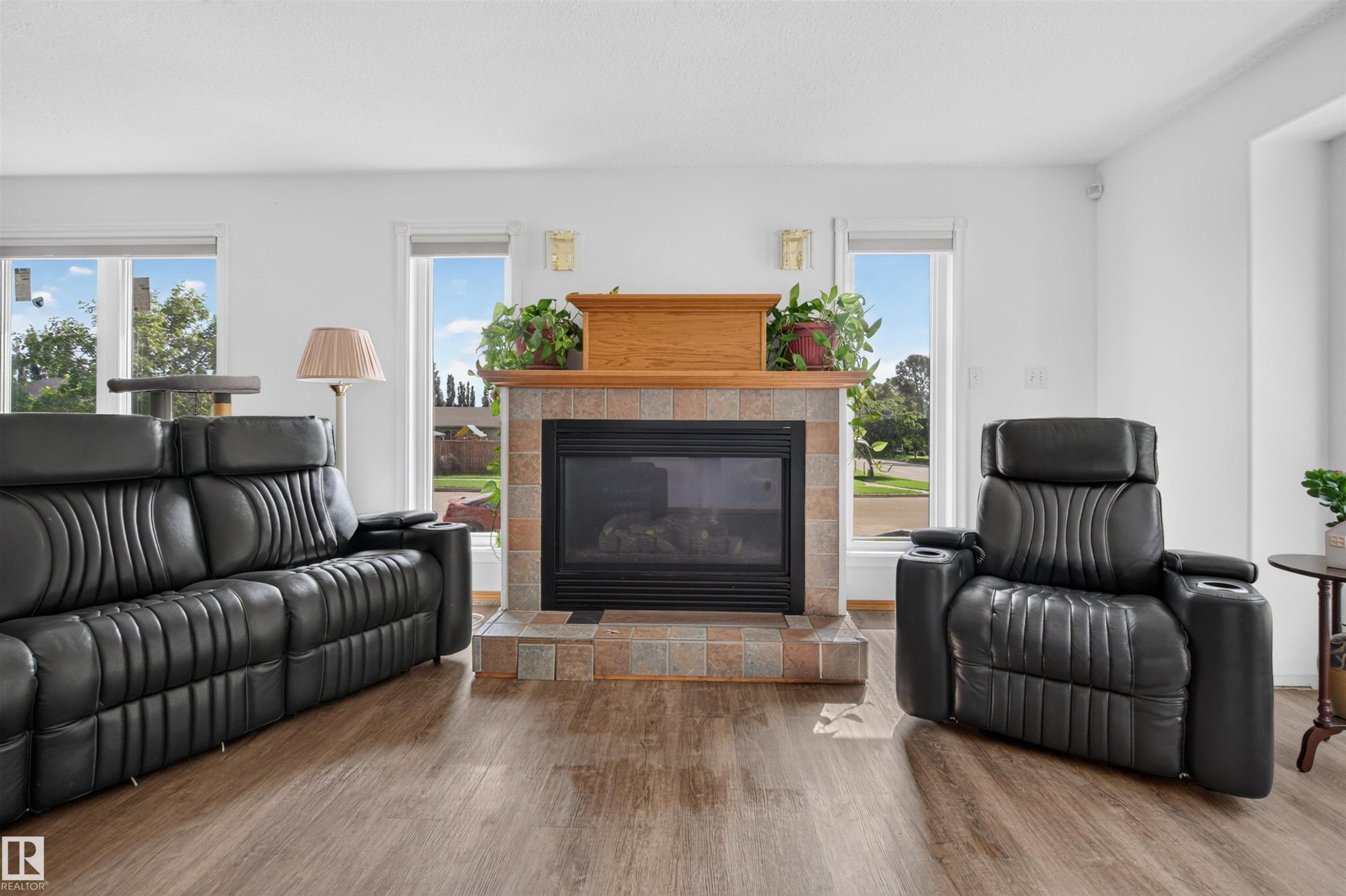 6000 54 Avenue, Camrose, AB - Indoor Photo Showing Living Room With Fireplace
