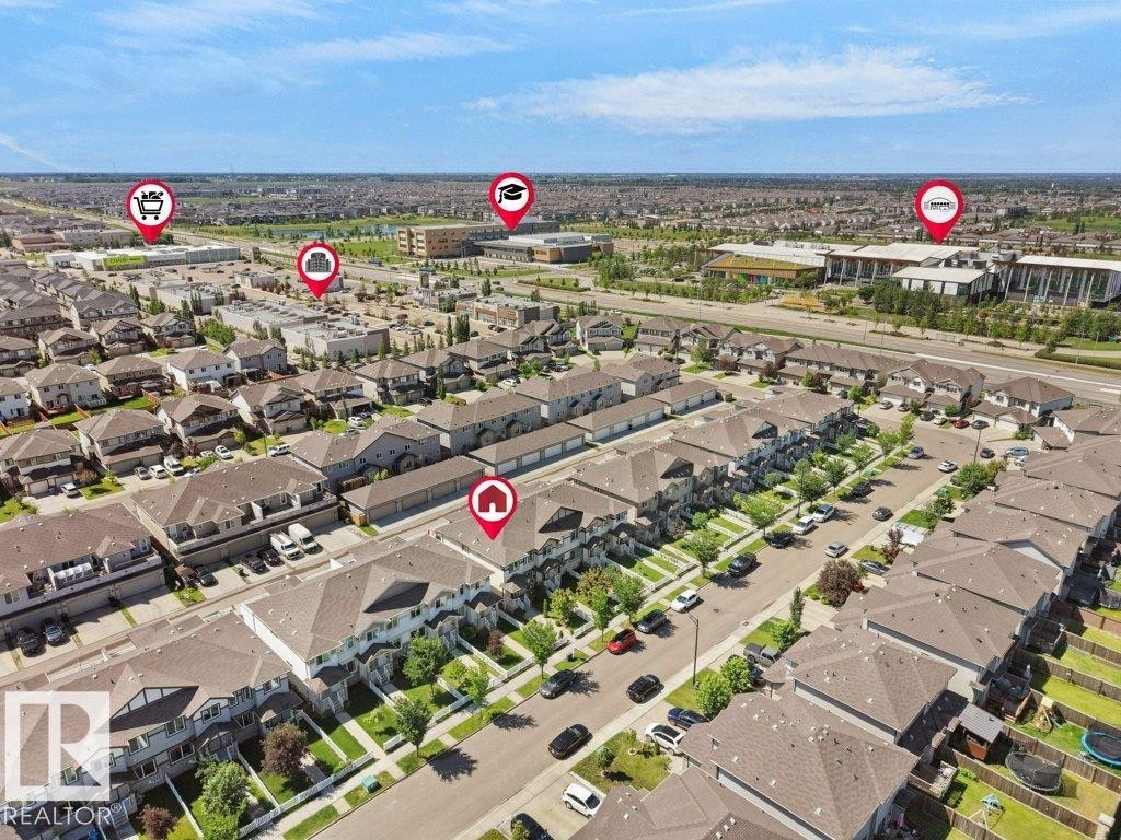 Aerial perspective of a developed residential area featuring multiple housing types - 1419 27 Av, Edmonton, AB