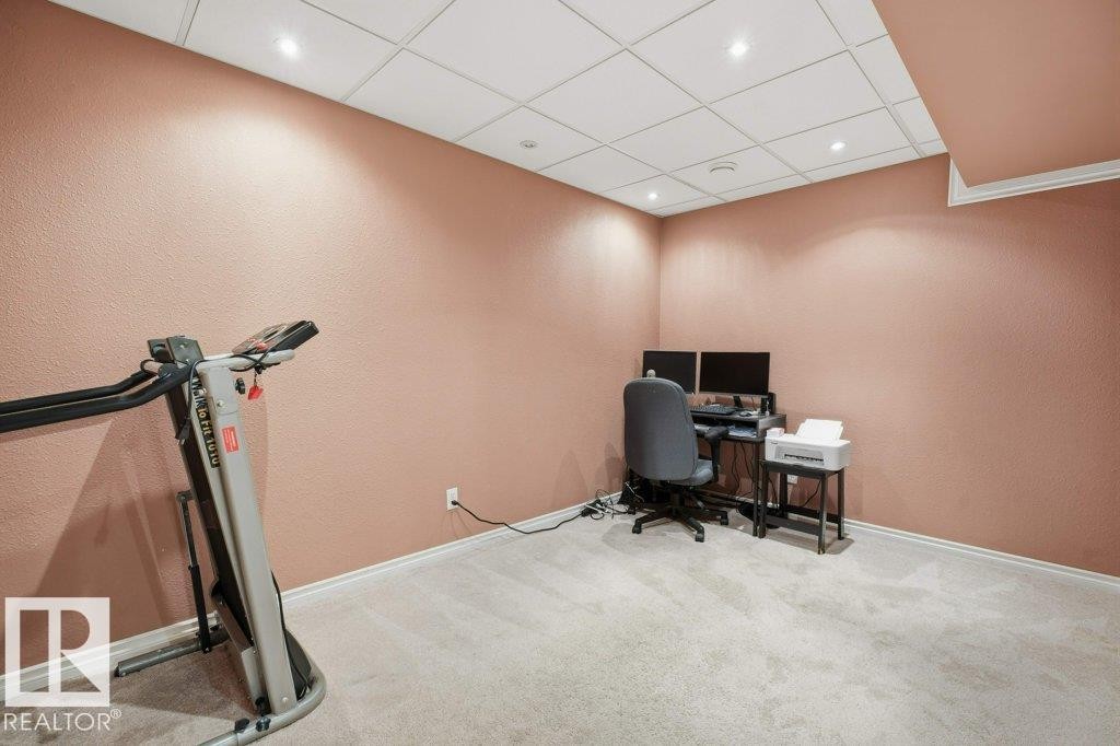 Carpeted room with recessed lighting and a drop ceiling - 30 1404 Hermitage Road, Edmonton, AB
