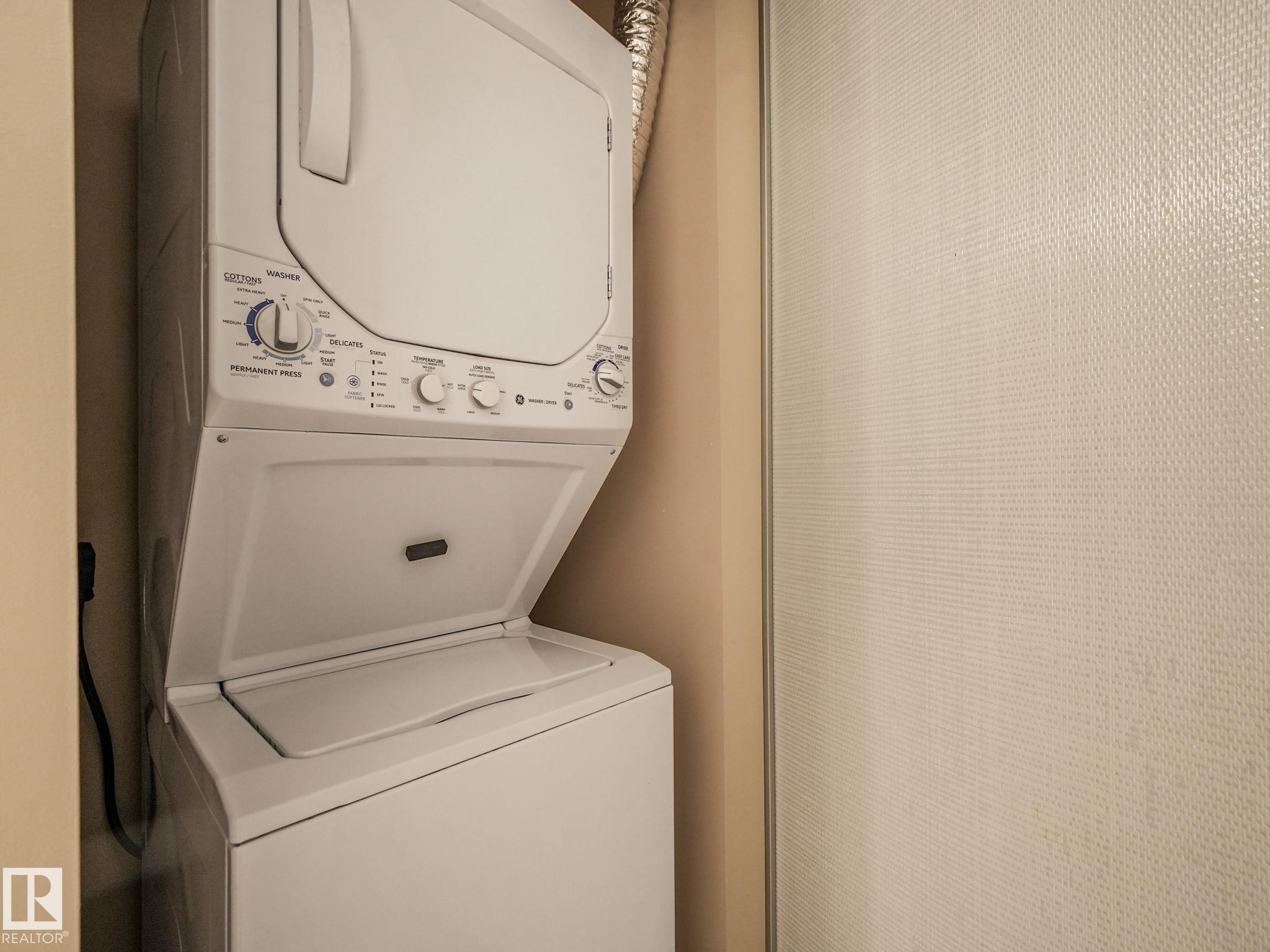 White stackable washer and dryer unit - 150 4827 104A Street, Edmonton, AB