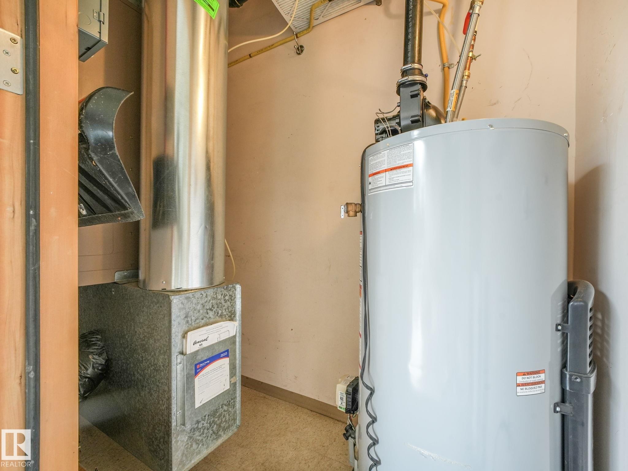 Water heater and furnace units within a utility space - 150 4827 104A Street, Edmonton, AB