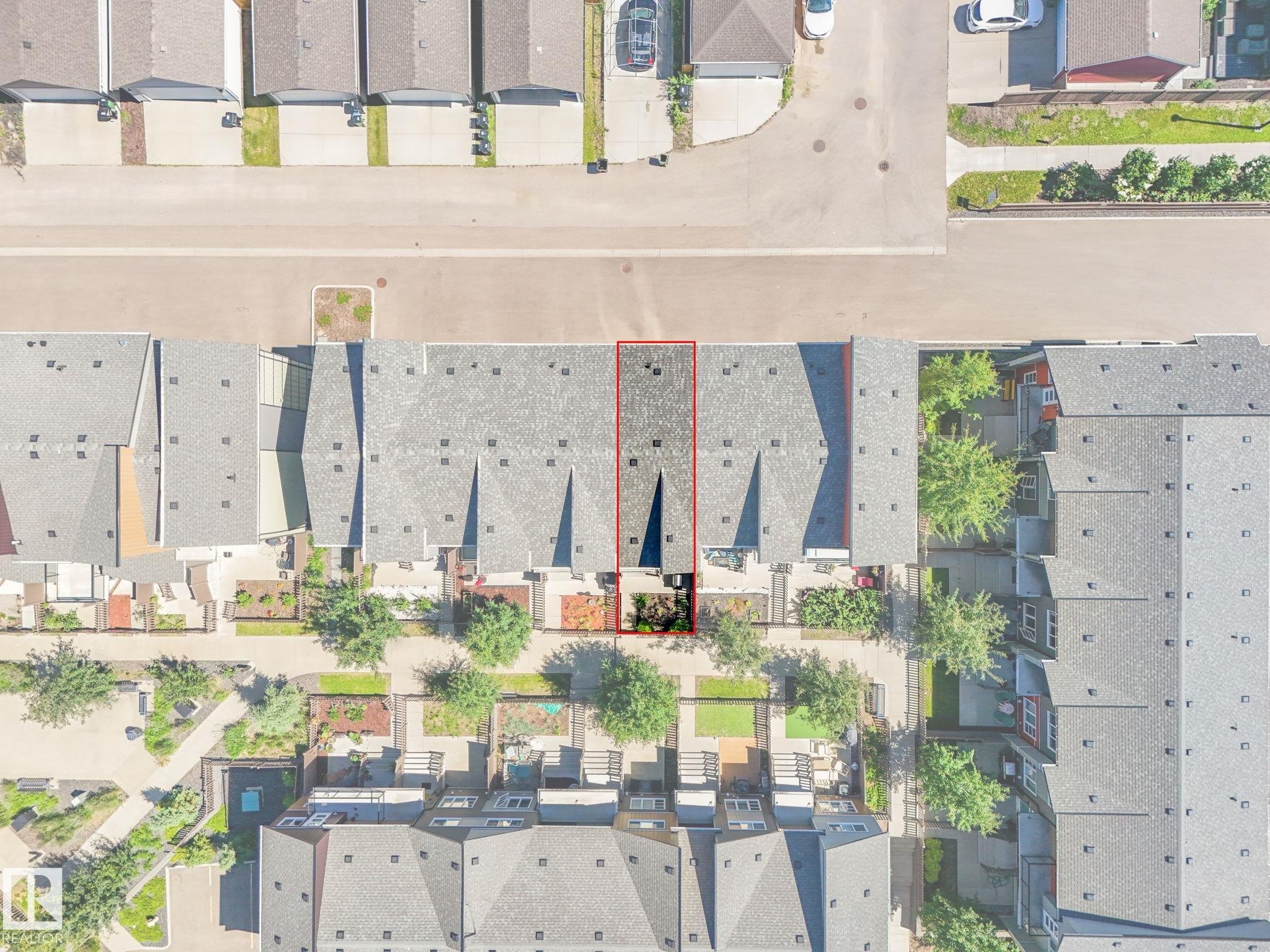 Aerial perspective showcasing a townhome property with a grey shingle roof - #55 4470 Prowse Rd Sw, Edmonton, AB - Other