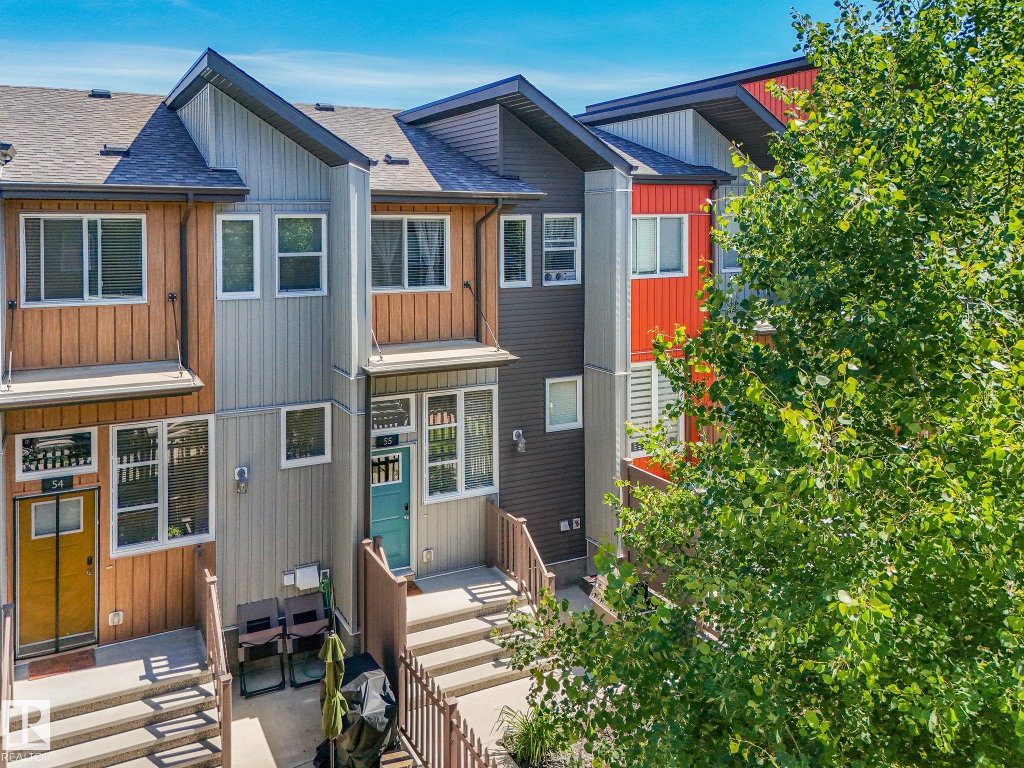 Multi-story townhome exterior featuring contemporary architectural design - #55 4470 Prowse Rd Sw, Edmonton, AB - Outdoor