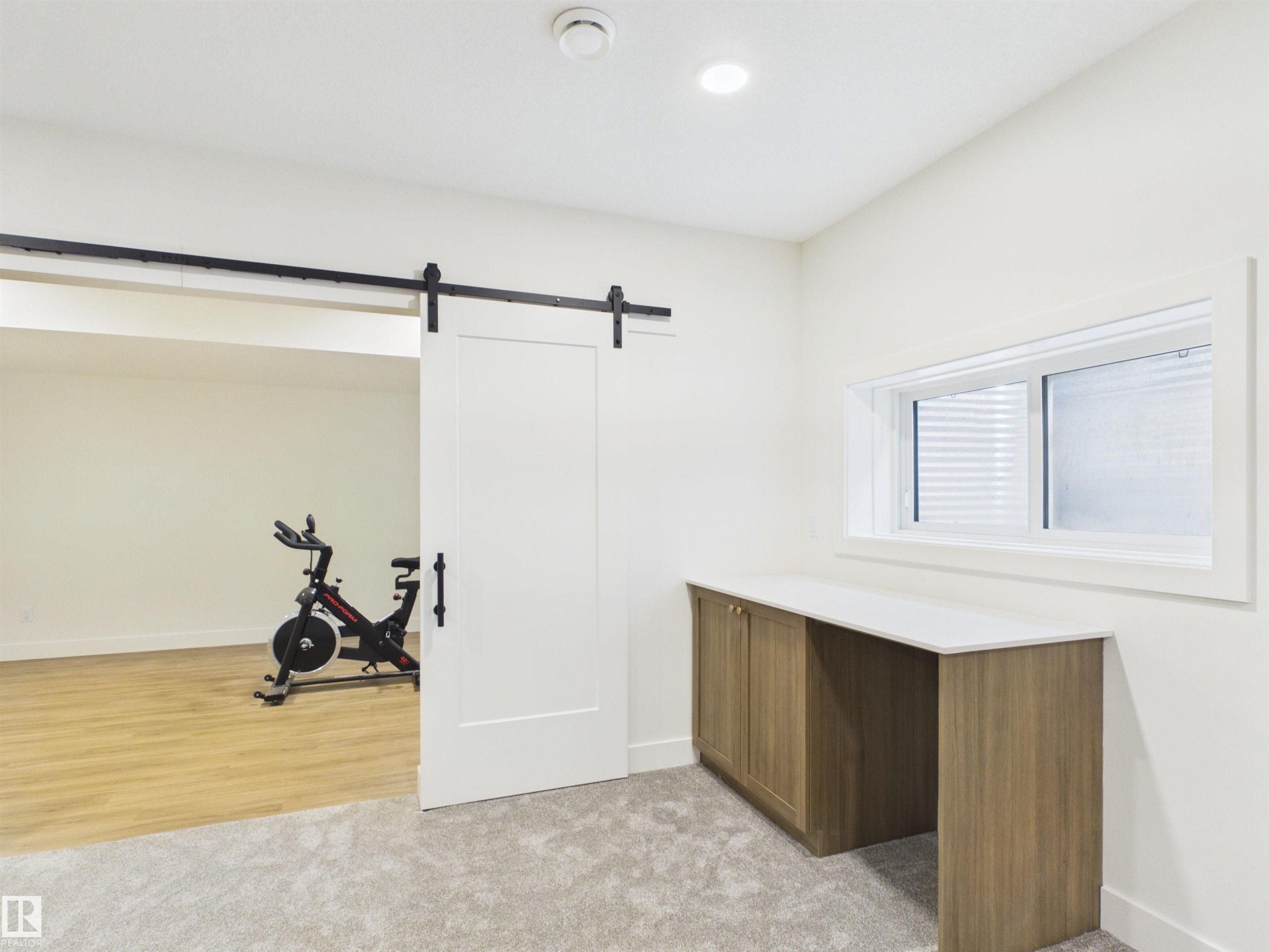 593 Genesis Wynd, Stony Plain, AB - Indoor Photo Showing Gym Room