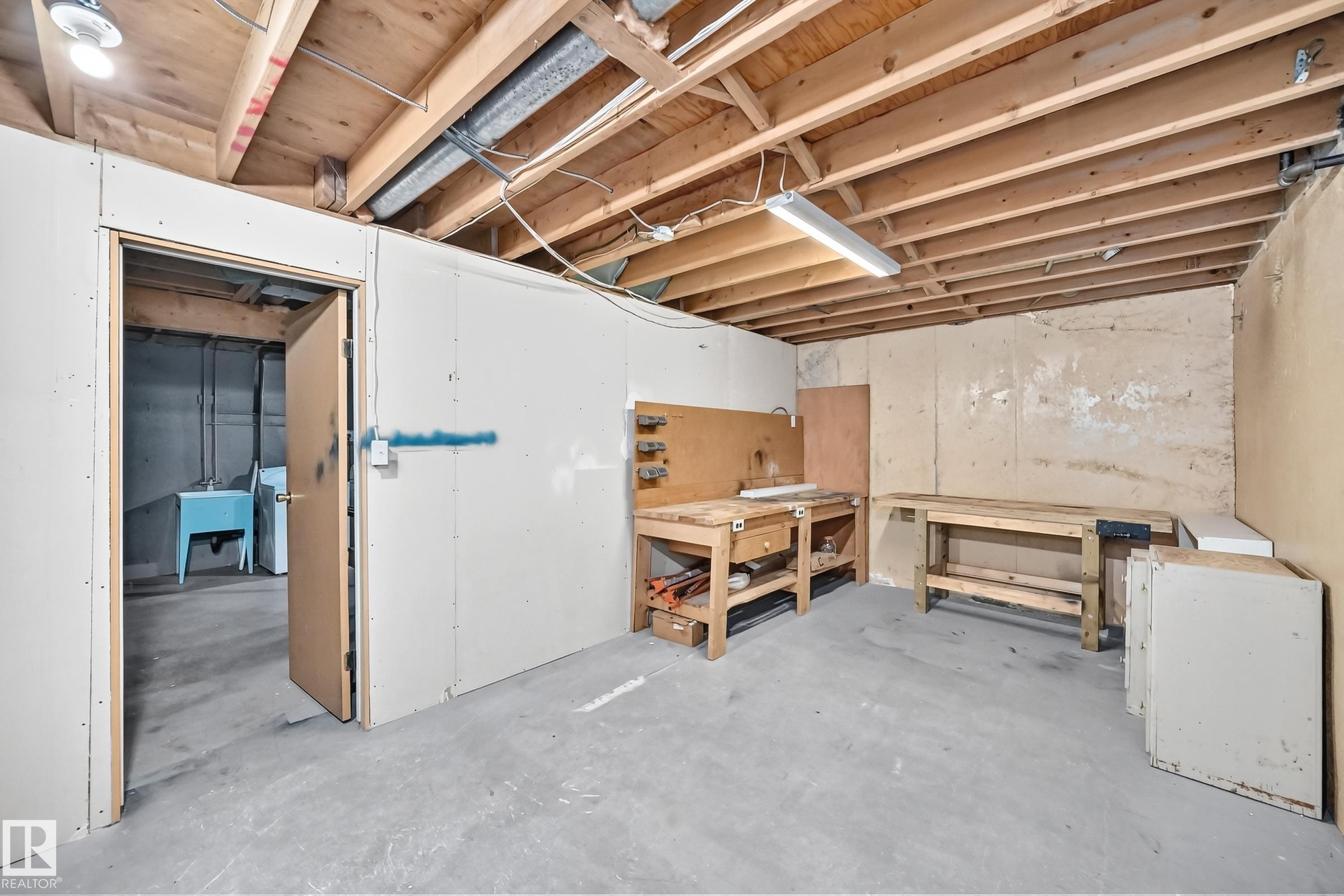 Unfinished basement offering exposed wood ceiling joists and concrete flooring - 355 Northgate Terrace, Edmonton, AB