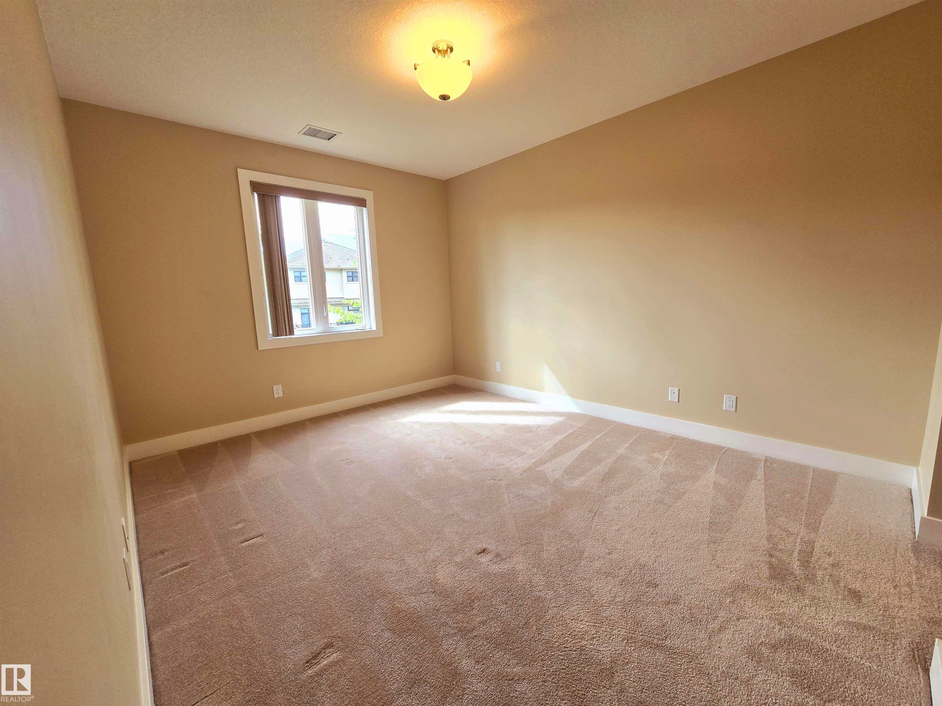 256 6079 Maynard Way, Edmonton, AB - Indoor Photo Showing Other Room