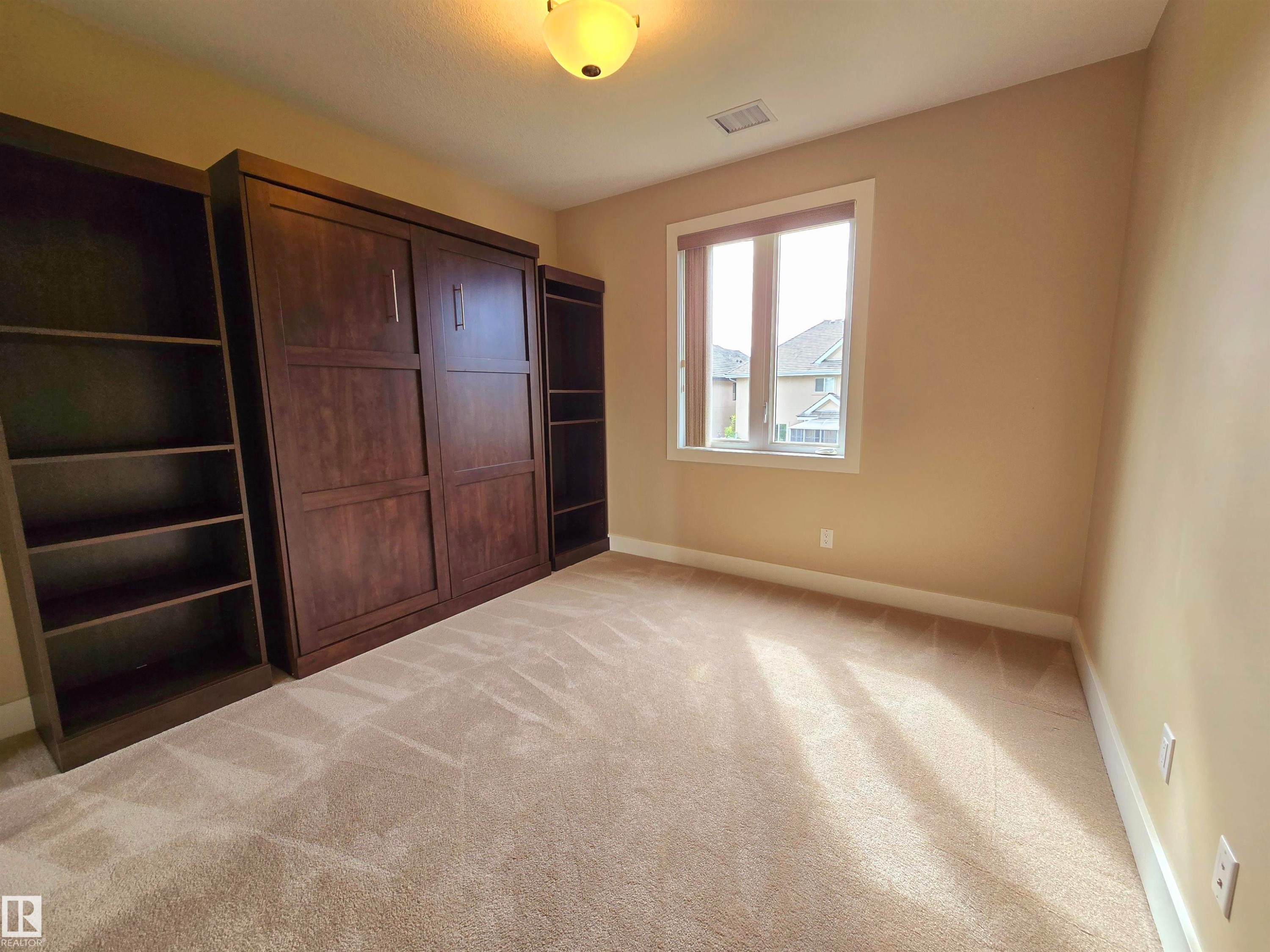 256 6079 Maynard Way, Edmonton, AB - Indoor Photo Showing Other Room