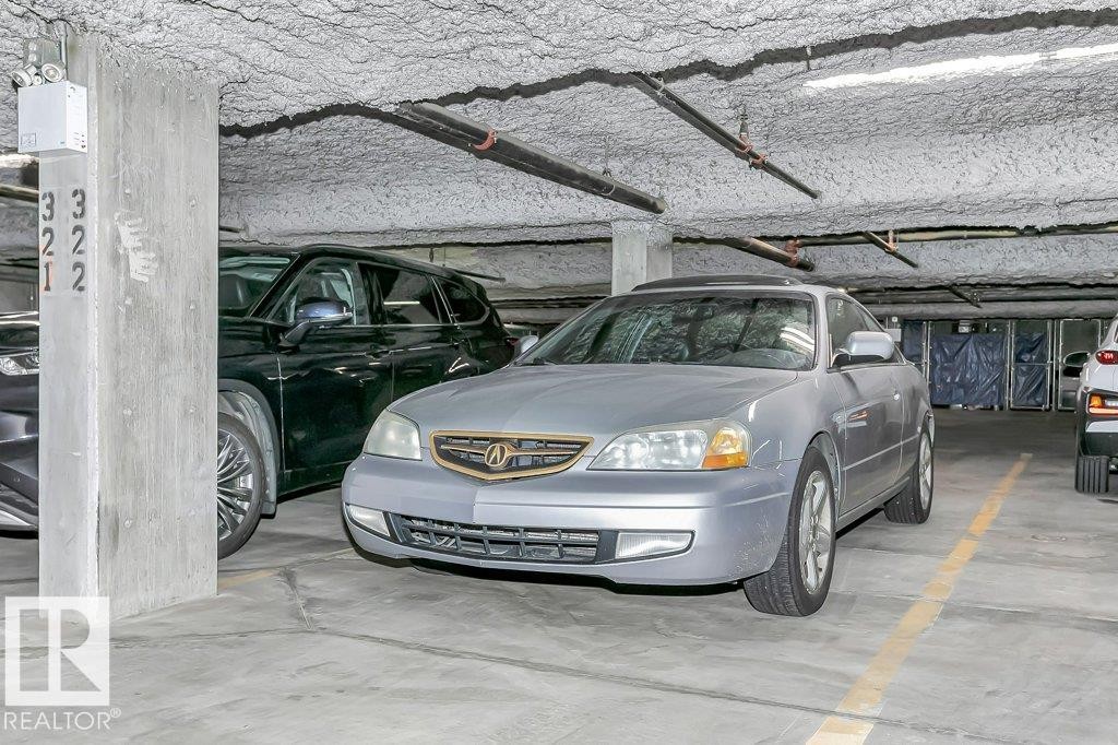 256 6079 Maynard Way, Edmonton, AB - Indoor Photo Showing Garage