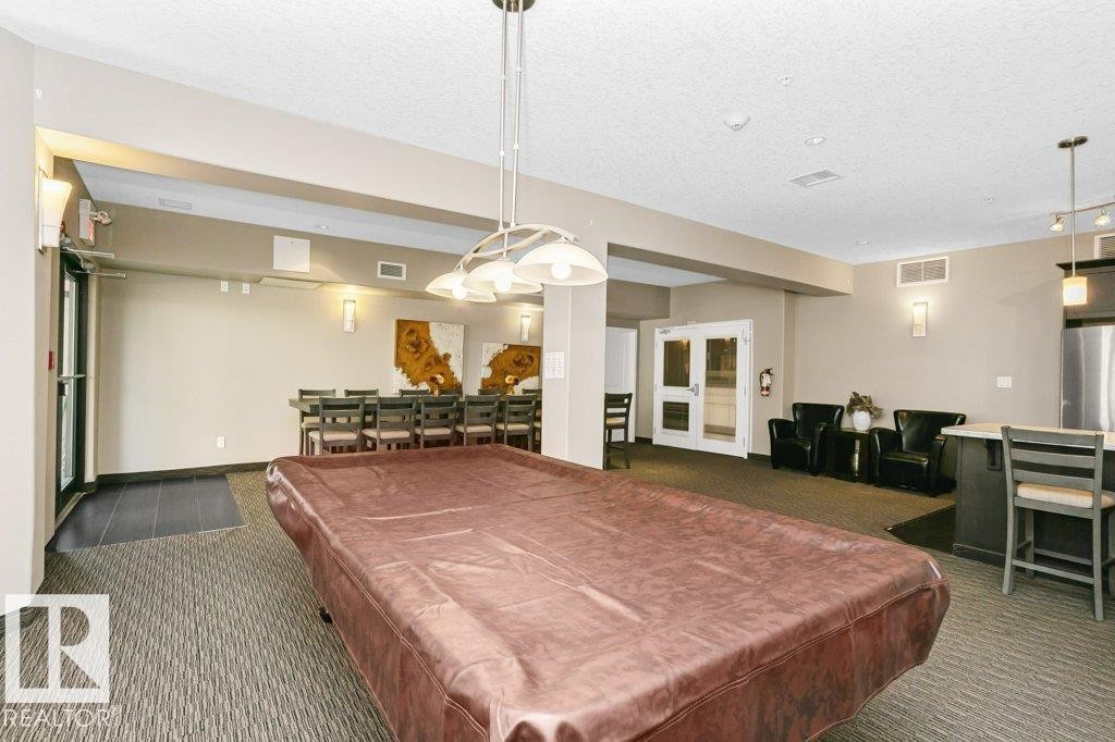 256 6079 Maynard Way, Edmonton, AB - Indoor Photo Showing Other Room