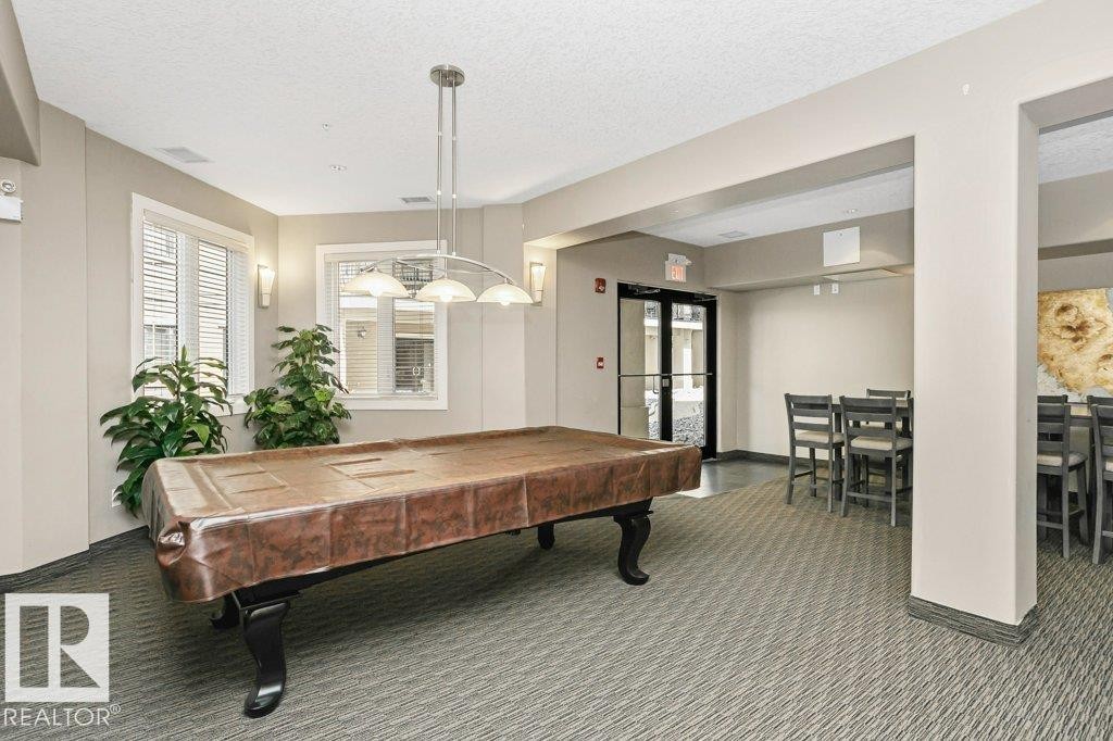 256 6079 Maynard Way, Edmonton, AB - Indoor Photo Showing Other Room