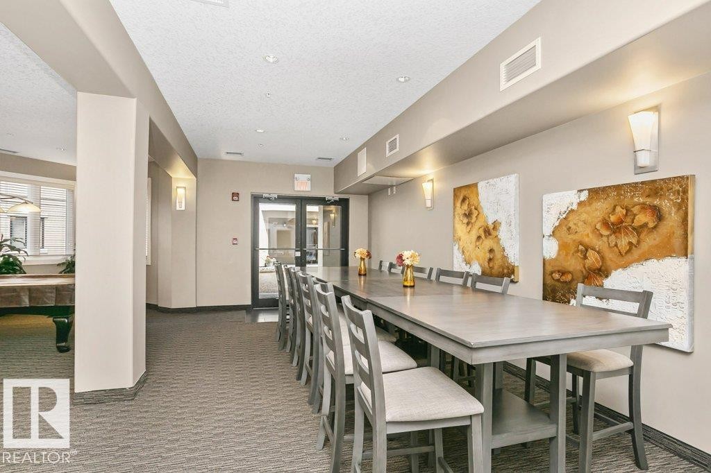 256 6079 Maynard Way, Edmonton, AB - Indoor Photo Showing Dining Room