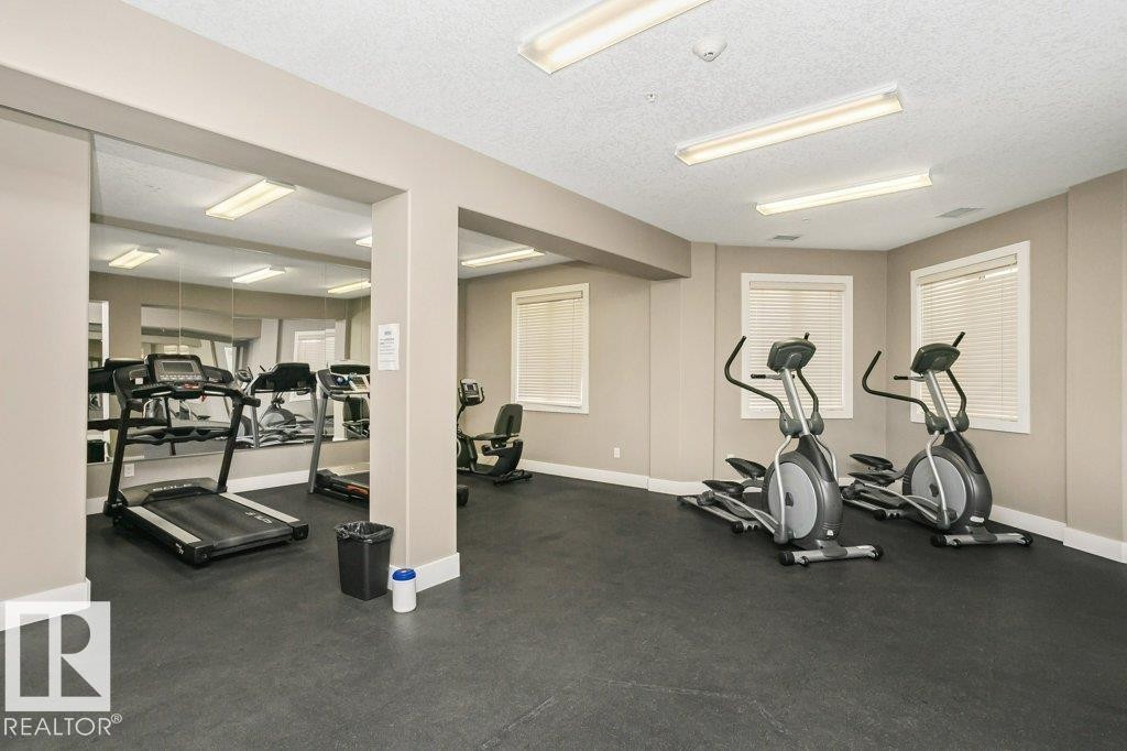 256 6079 Maynard Way, Edmonton, AB - Indoor Photo Showing Gym Room