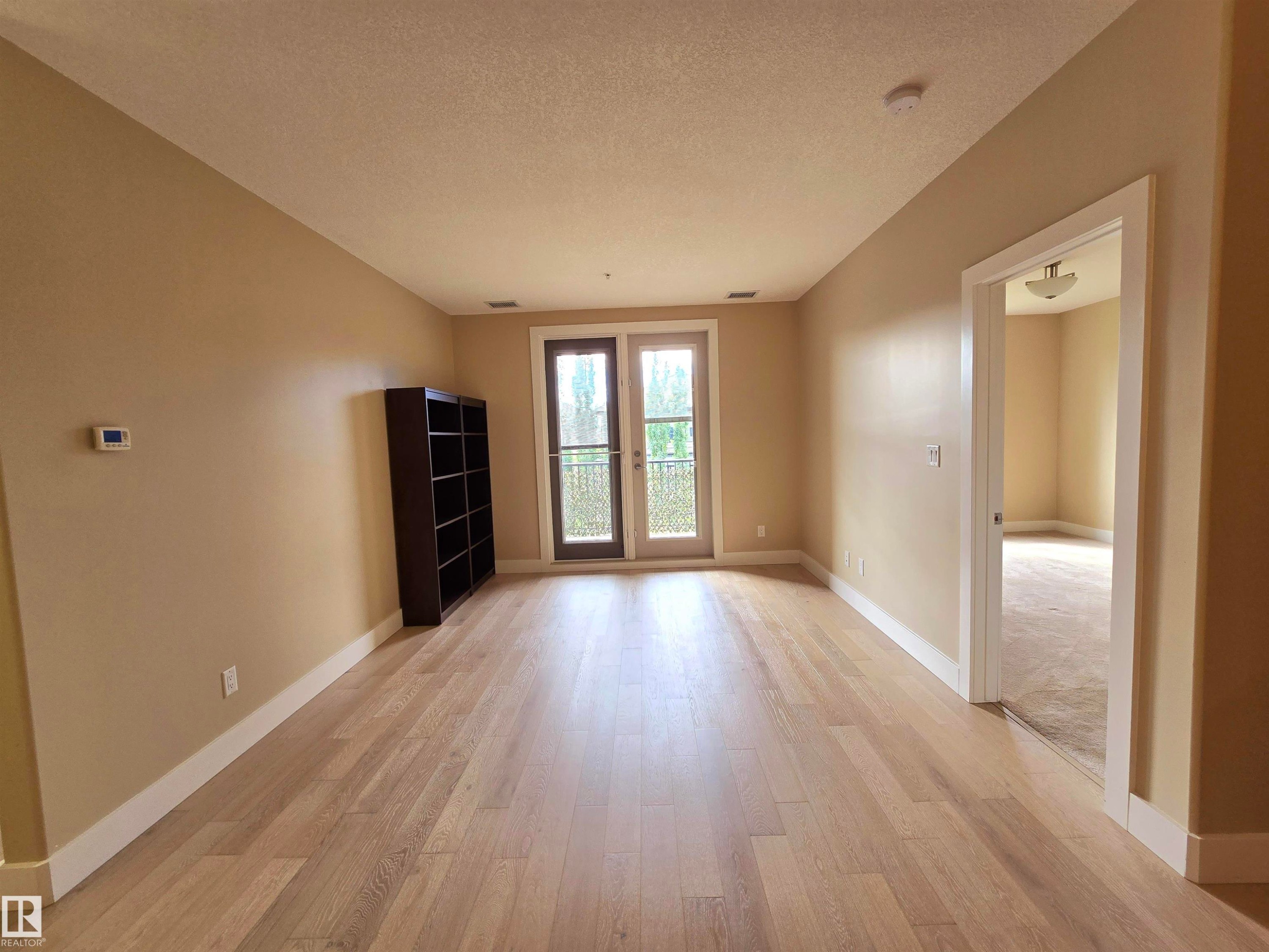 256 6079 Maynard Way, Edmonton, AB - Indoor Photo Showing Other Room