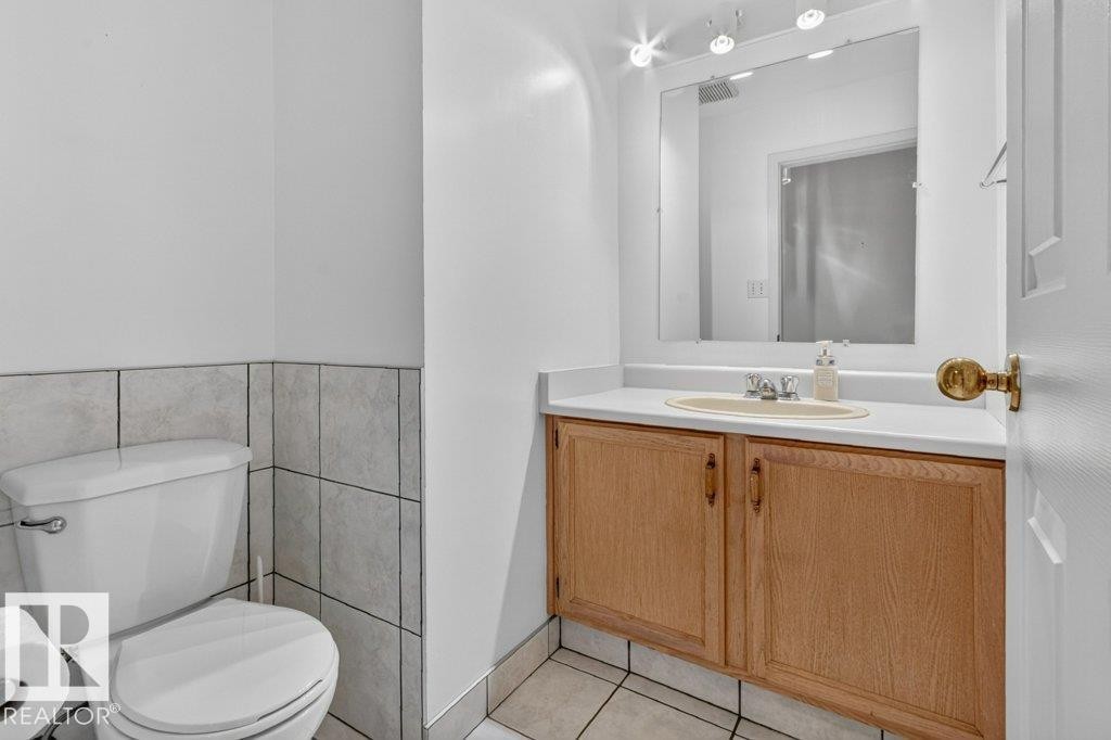Main floor half bathroom. - 16524 99 Street Nw, Edmonton, AB - Indoor Photo Showing Bathroom