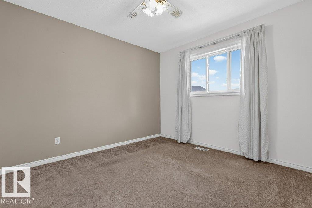 Upstairs bedroom. - 16524 99 Street Nw, Edmonton, AB - Indoor Photo Showing Other Room
