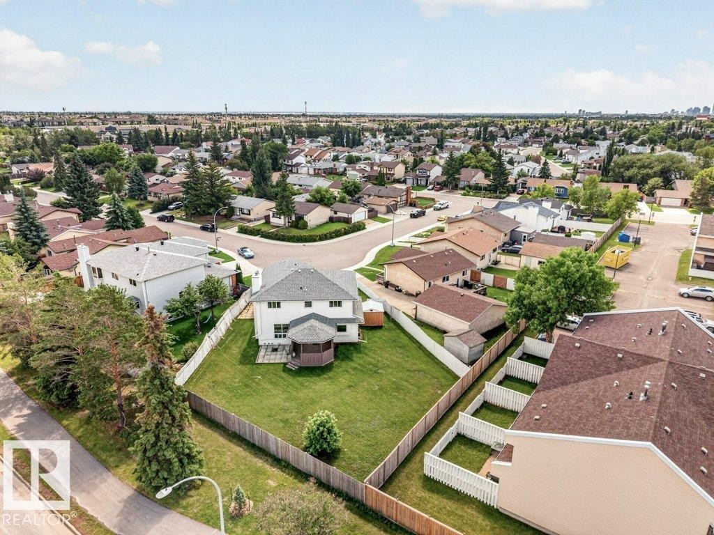 Spacious property with a large, fenced backyard featuring a gazebo - 16524 99 Street Nw, Edmonton, AB - Outdoor With View