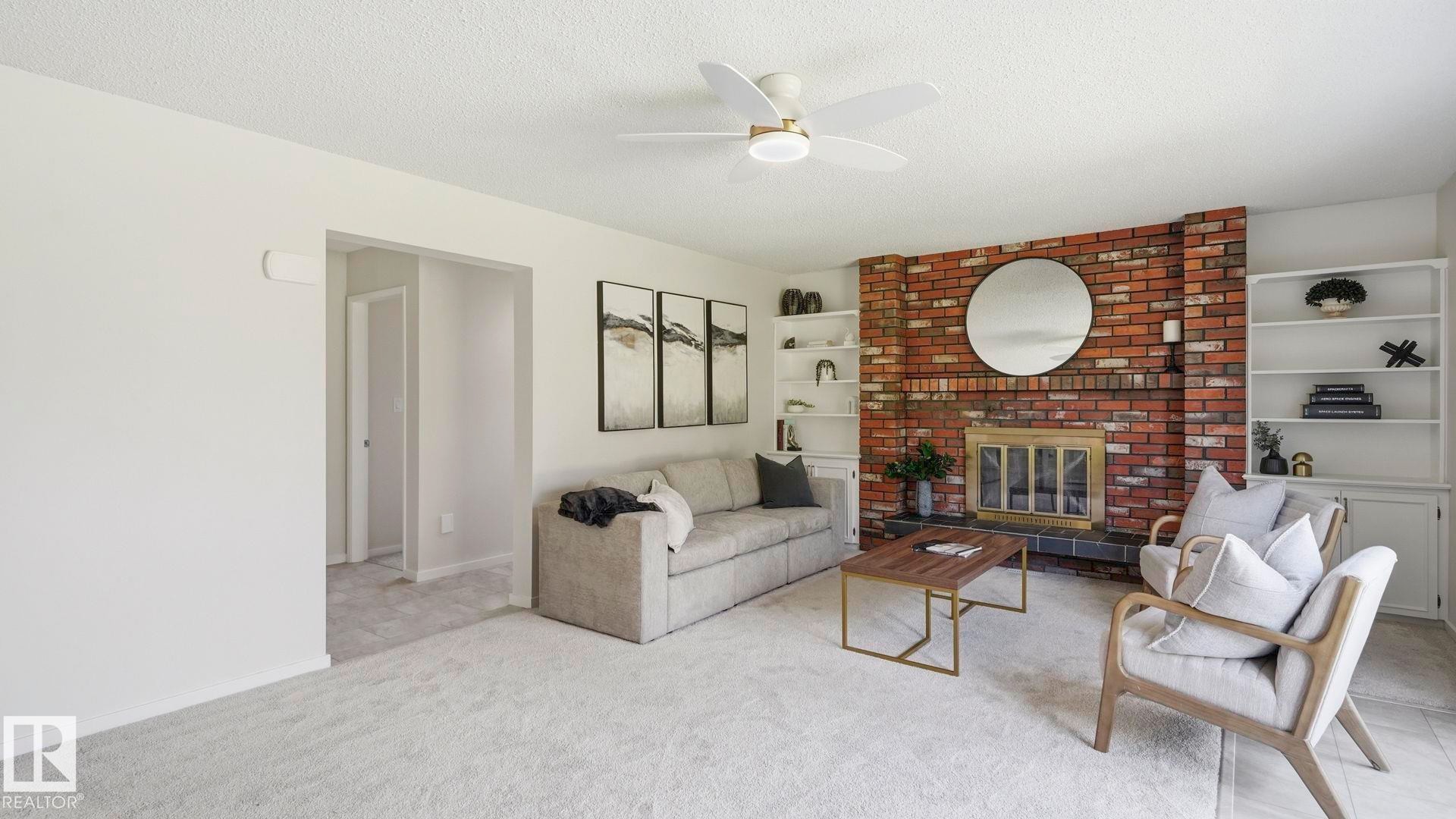 2723 83 Street Nw, Edmonton, AB - Indoor Photo Showing Other Room With Fireplace