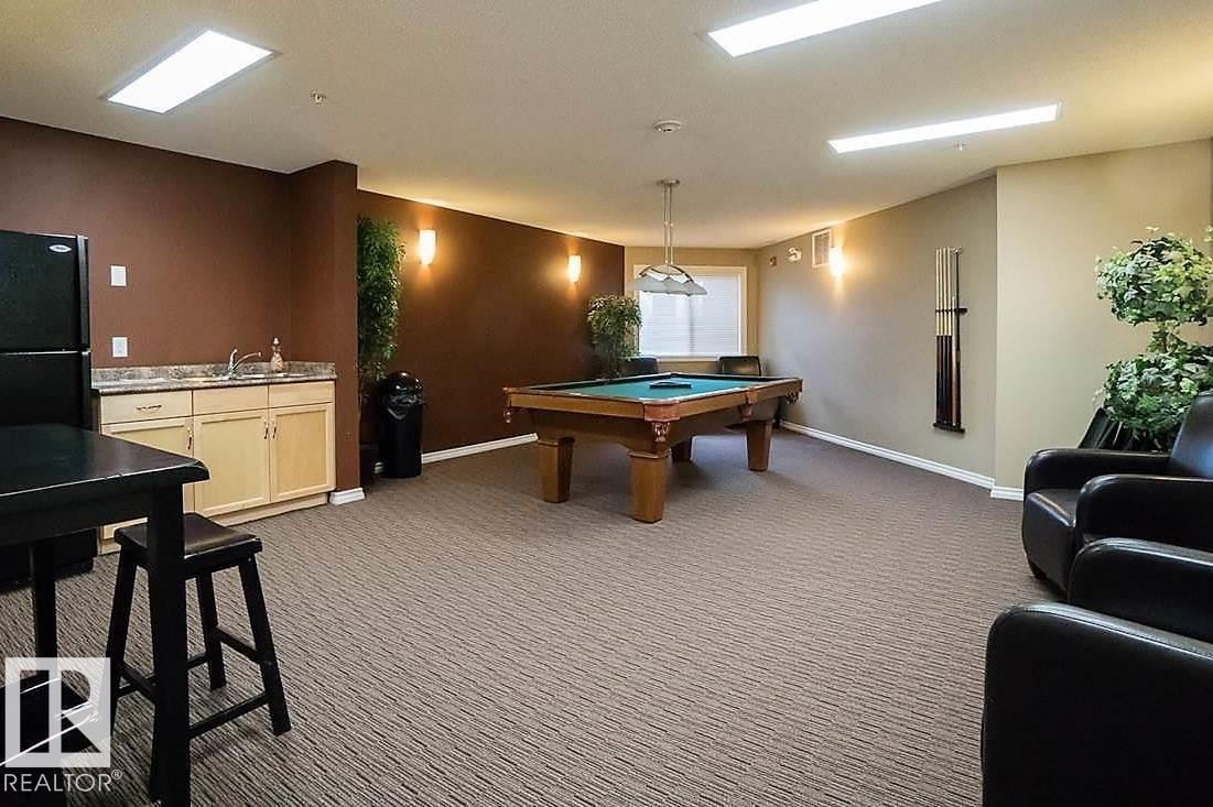#411 5951 165 Av Nw, Edmonton, AB - Indoor Photo Showing Other Room