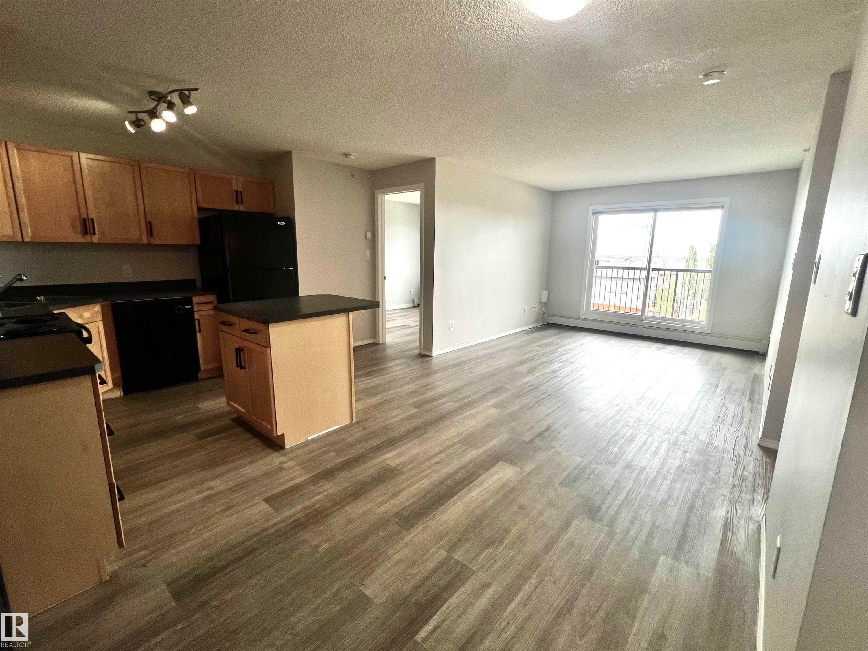 #411 5951 165 Av Nw, Edmonton, AB - Indoor Photo Showing Kitchen With Double Sink