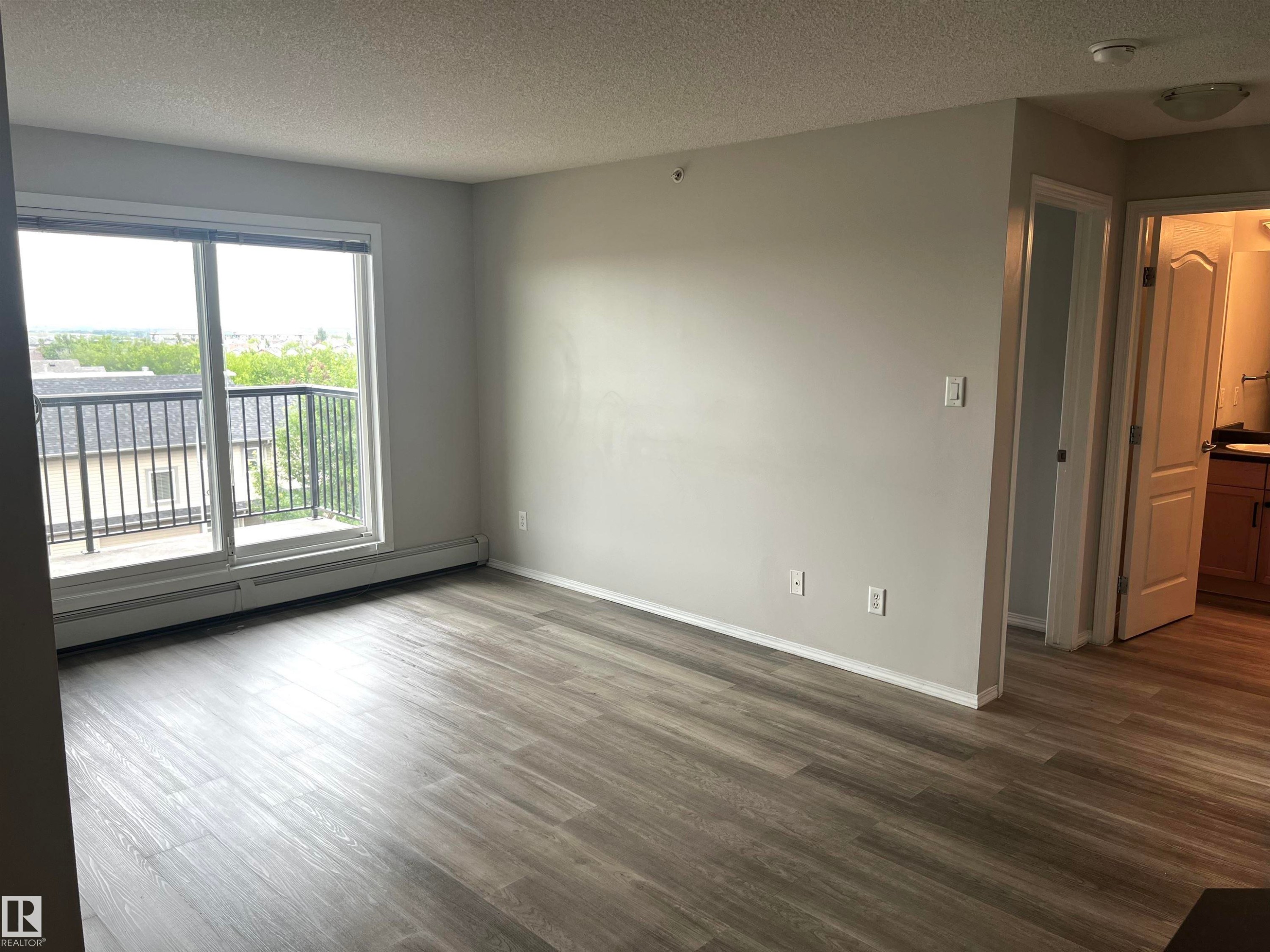 #411 5951 165 Av Nw, Edmonton, AB - Indoor Photo Showing Other Room