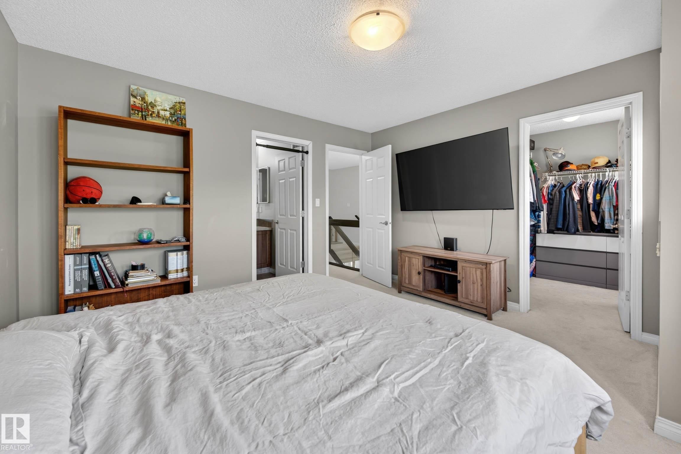 Bedroom featuring light gray walls, carpet flooring, and a flush mount ceiling light - 2007 72 Street, Edmonton, AB - Indoor Photo Showing Bedroom