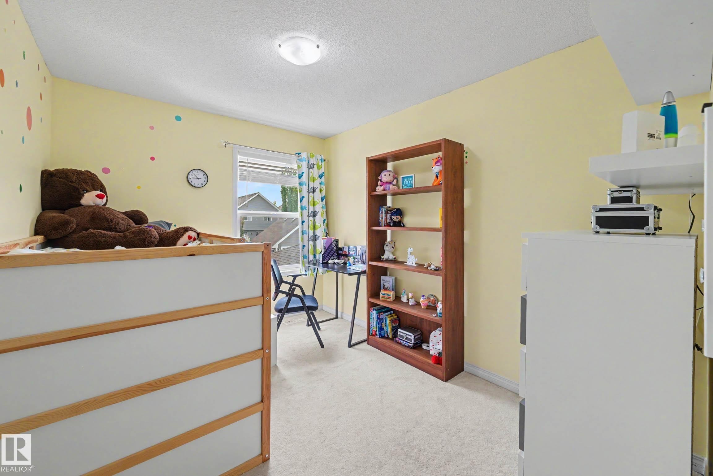 Light-colored walls and carpeting create a bright interior - 2007 72 Street, Edmonton, AB - Indoor Photo Showing Other Room