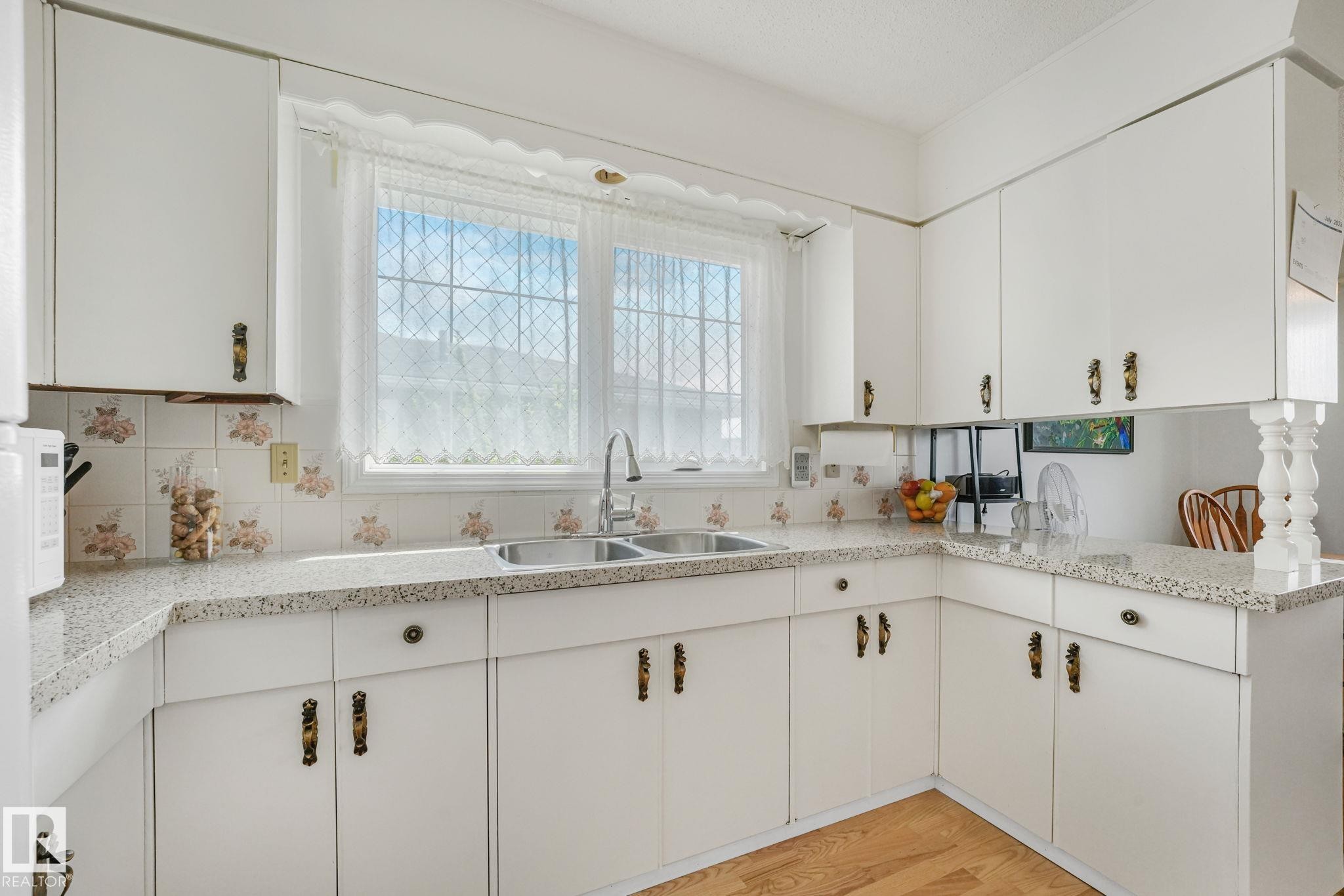 14203 74 Street Nw, Edmonton, AB - Indoor Photo Showing Kitchen With Double Sink
