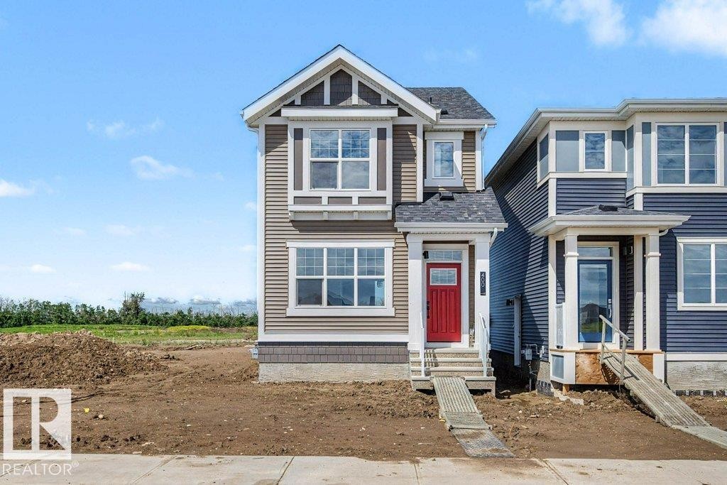 400 Stiles Way, Leduc, AB - Outdoor With Facade