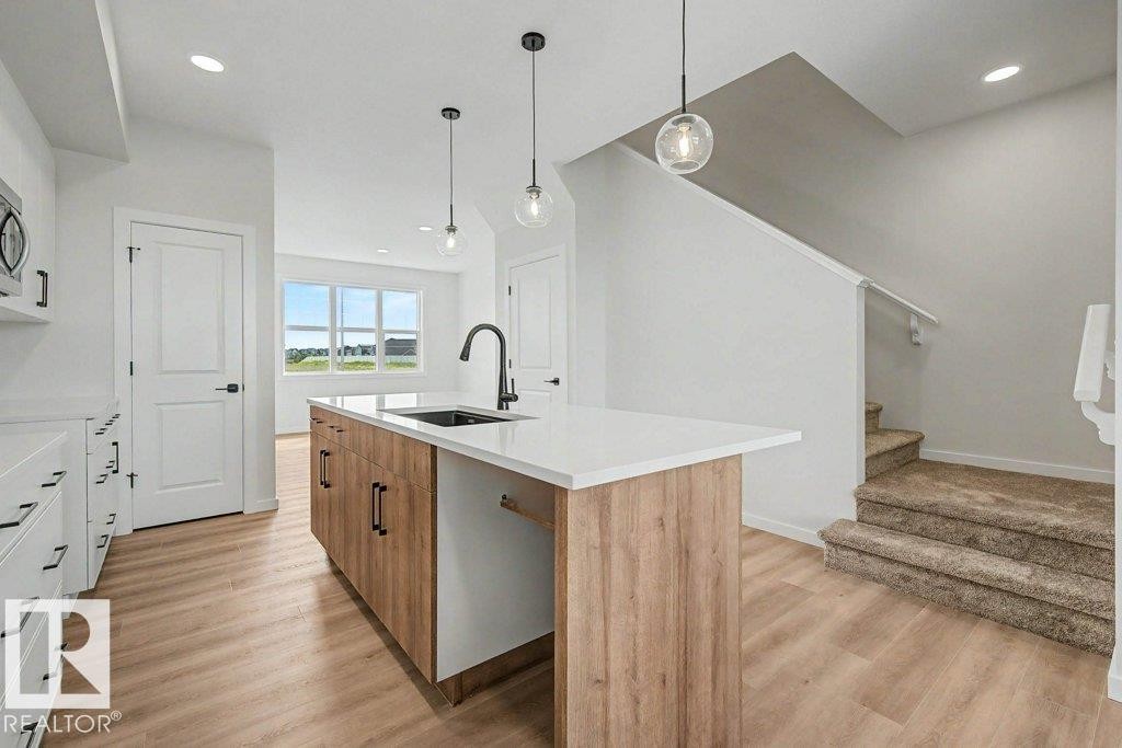 400 Stiles Way, Leduc, AB - Indoor Photo Showing Kitchen With Upgraded Kitchen